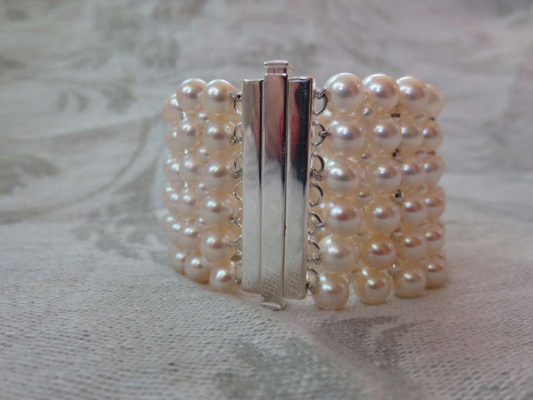 Contemporary Marina J. Multi Strand Woven White Pearl Cuff Bracelet with Silver Sliding Clasp