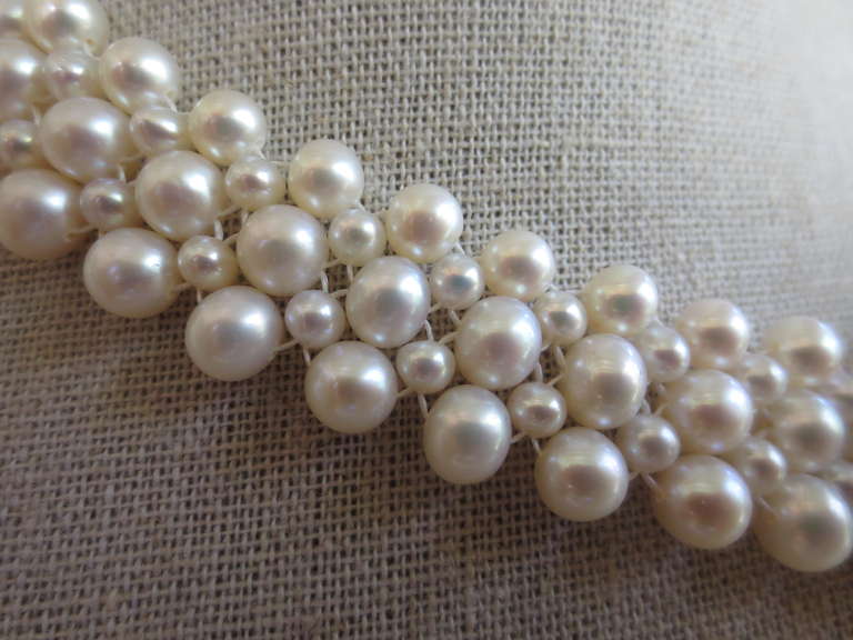 pearl necklace with gold clasp in front