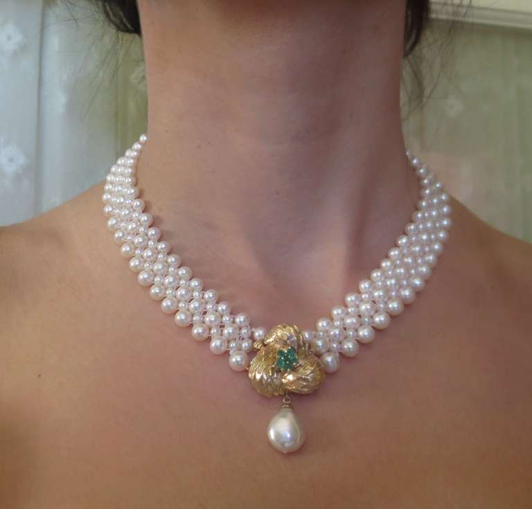 Contemporary Woven White Pearl Necklace with Emerald and 14k Yellow Gold Front Facing Clasp