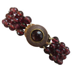 Unique Multi string woven Facetet Garnet beads and 14 k yellow gold & Bracelet 9