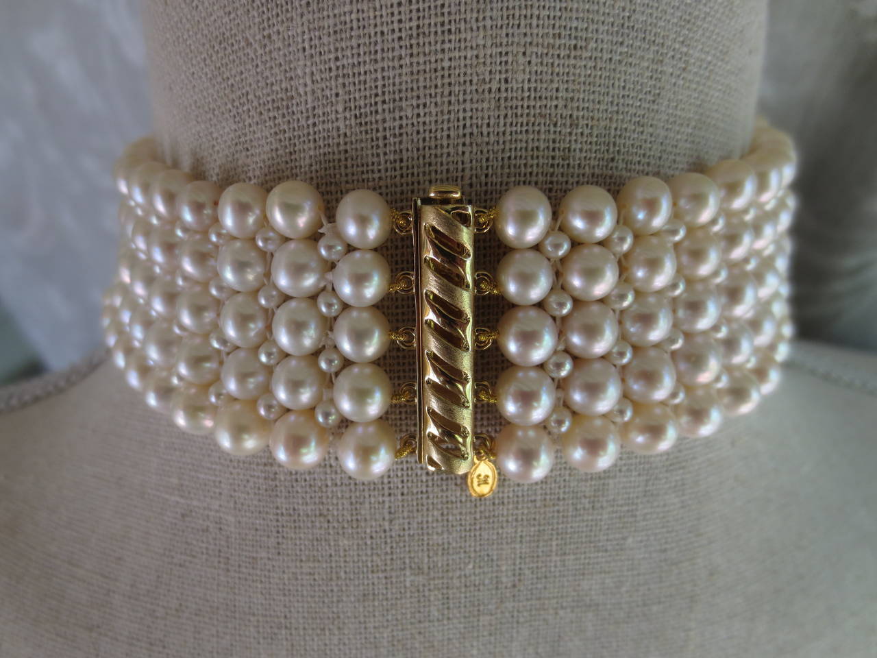 Intricately hand woven choker is made of 6-7 mm cultured pearls and 3mm pearls. Choker measure 13