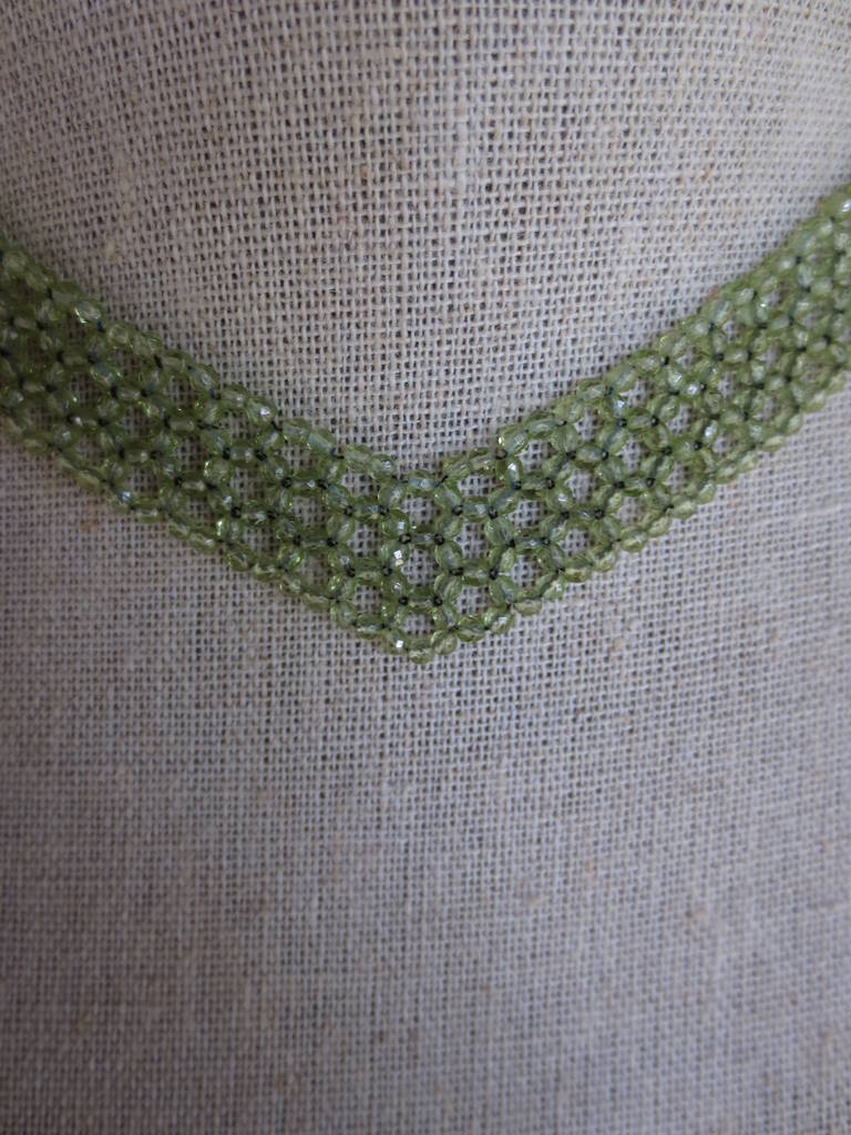 Woven faceted Peridot beaded Necklace. With gold clasp 1