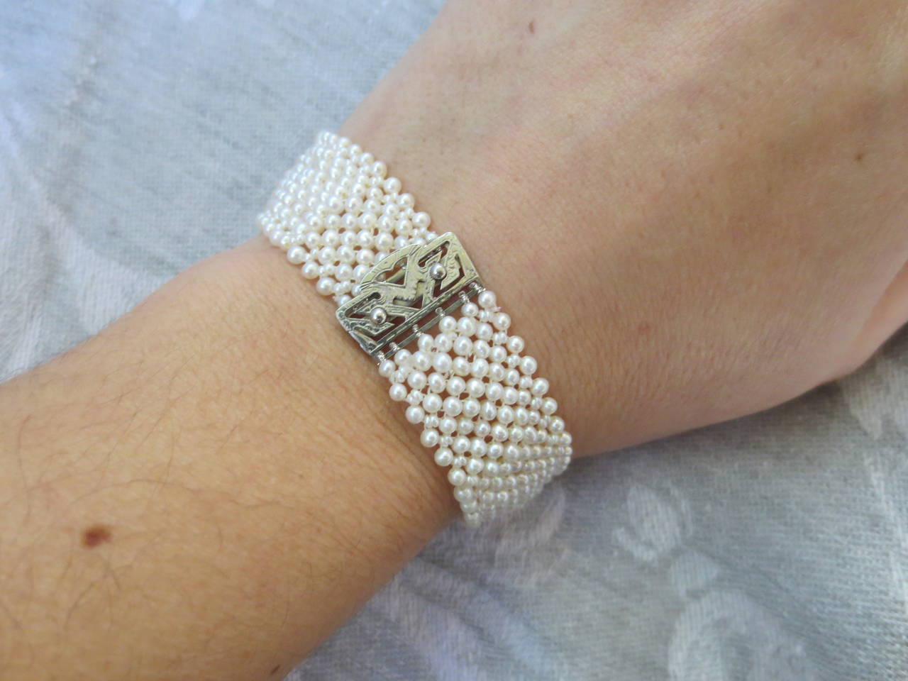 Seed Pearl Multi-Strand Woven Bracelet with 14 Karat White Gold Vintage Clasp In Excellent Condition In Los Angeles, CA