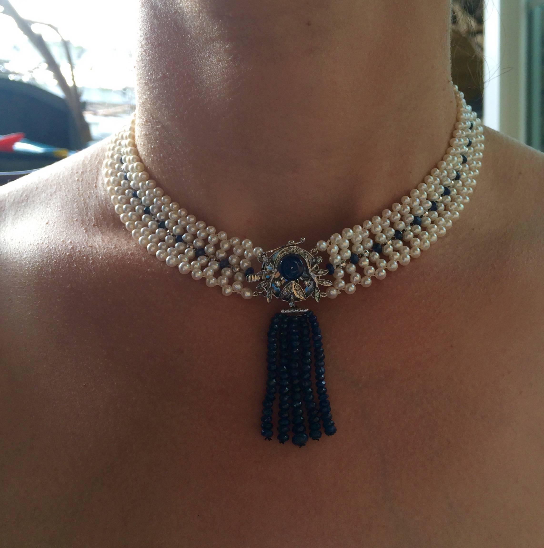 One of a kind sapphire and pearl woven necklace with unique Mid 20 century clasp that is also a centerpiece (located in front), is 21 inches long and has  lush sapphire bead tassel that hangs  from a diamond bar. This designer piece allows  the
