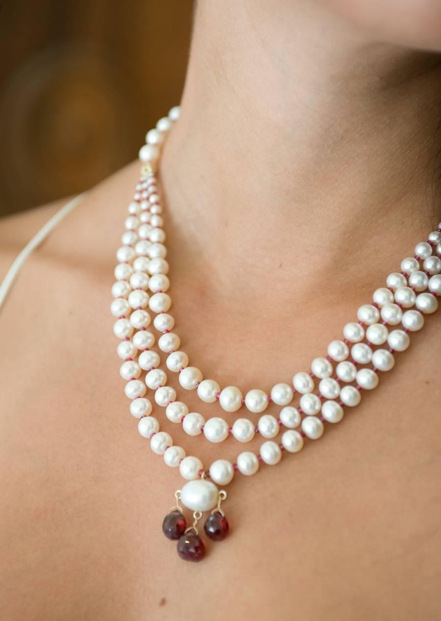 Hand woven by Marina J. in Los Angeles. Beautiful all real white Pearl Strand and Ruby necklace. This stunning piece features Graduated Strands alternating from real high luster white Pearls (1mm - 7mm) and Garnet, capped with decorative 14k Yellow
