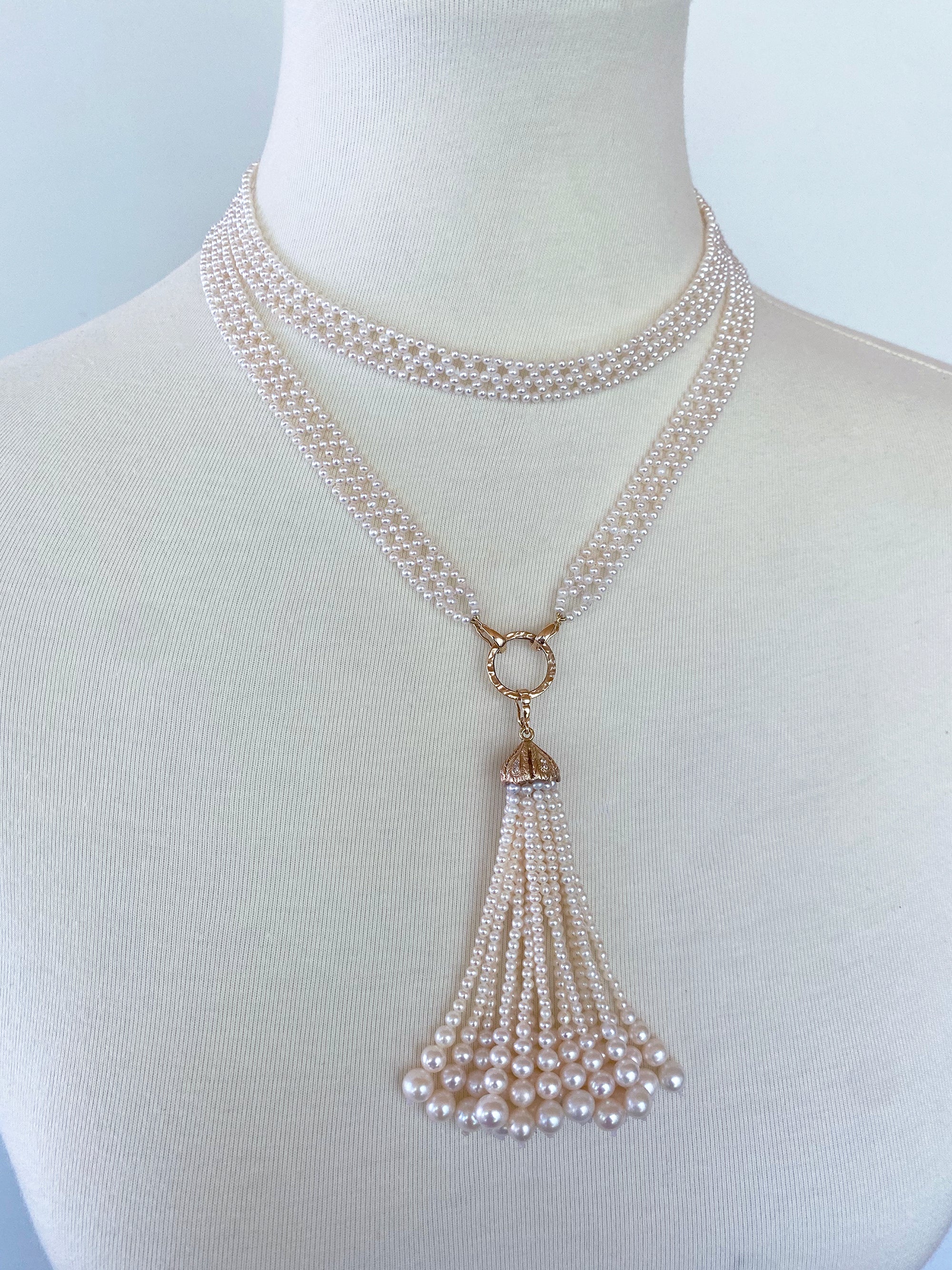This dazzling woven pearl sautoir has an intricate rope like design with 2mm and 6mm pearls. A classic and timeless piece has a variety of wearable options at 48.5 inches long, including adding one's own brooches and family heirlooms. The tassel