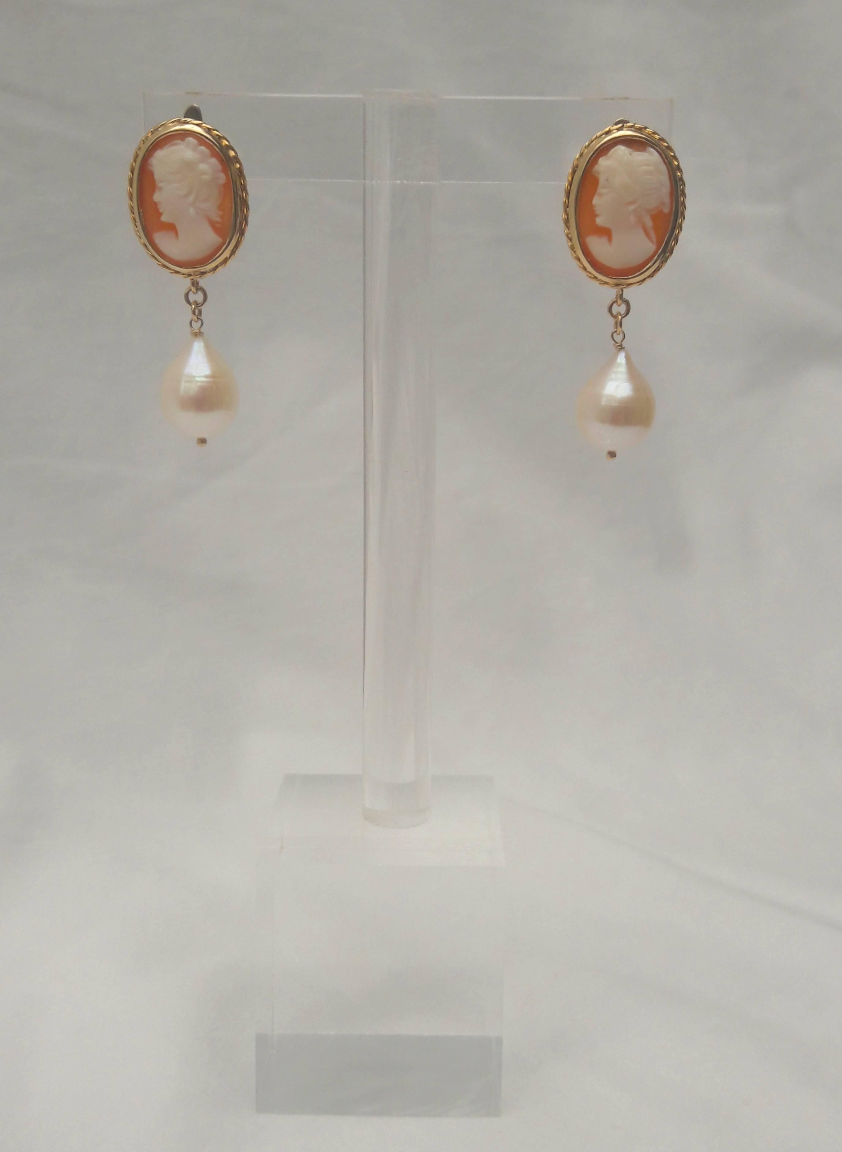 One-of-a kind Hand Carved European cameo earrings, in yellow gold setting.
Paired with large teardrop pearl. 
Secured with (European style) clip-on locking stud.

End to end measures 1.25 inches long

Made by Marina J. 2017

**All Marina Handmade