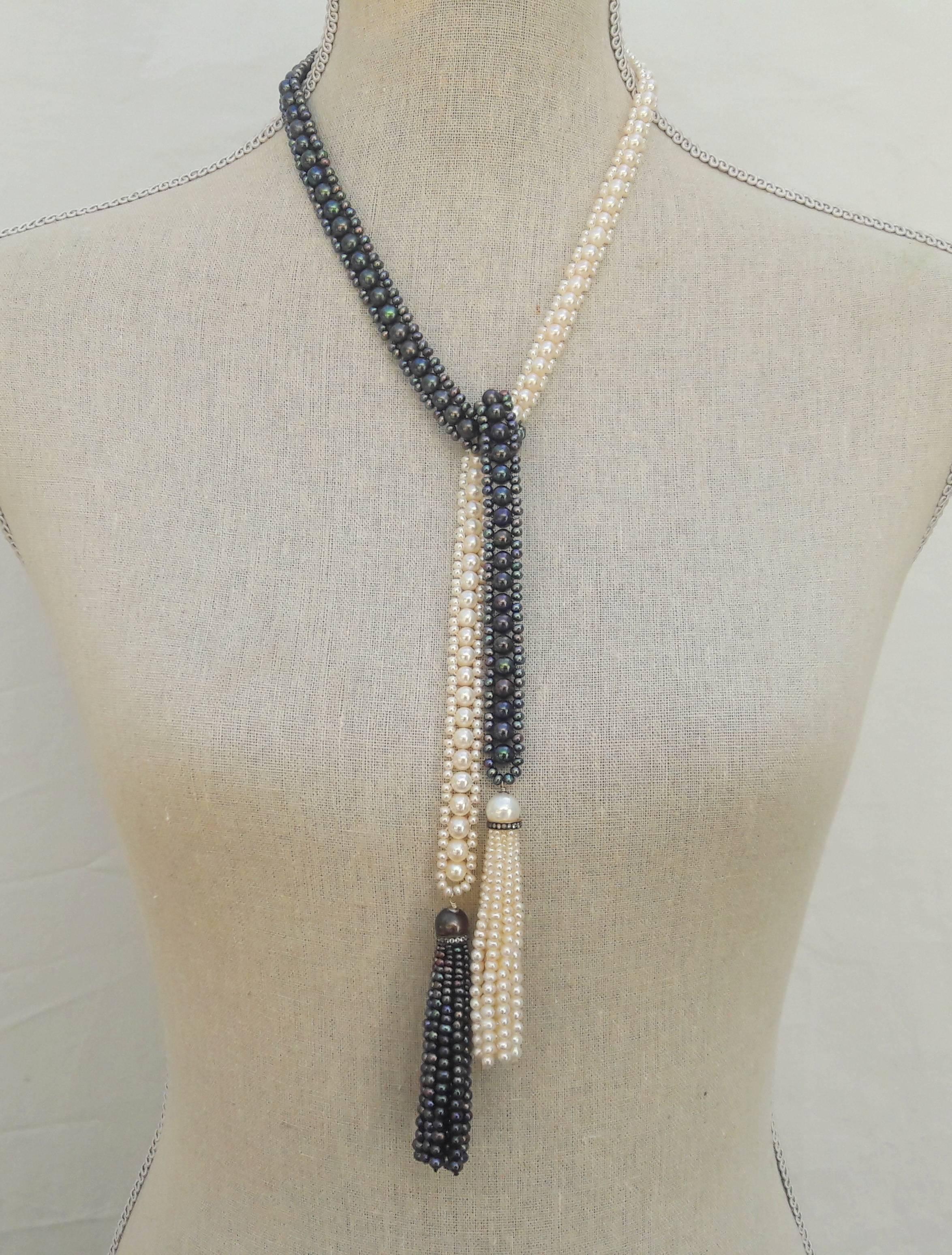 This beautiful and dramatic necklace draws its inspiration from the Art Deco color contrast and composition. This versatile necklace can be worn in a variety of different ways: long, wrapped, and tied, with or without brooch (brooch NOT included in
