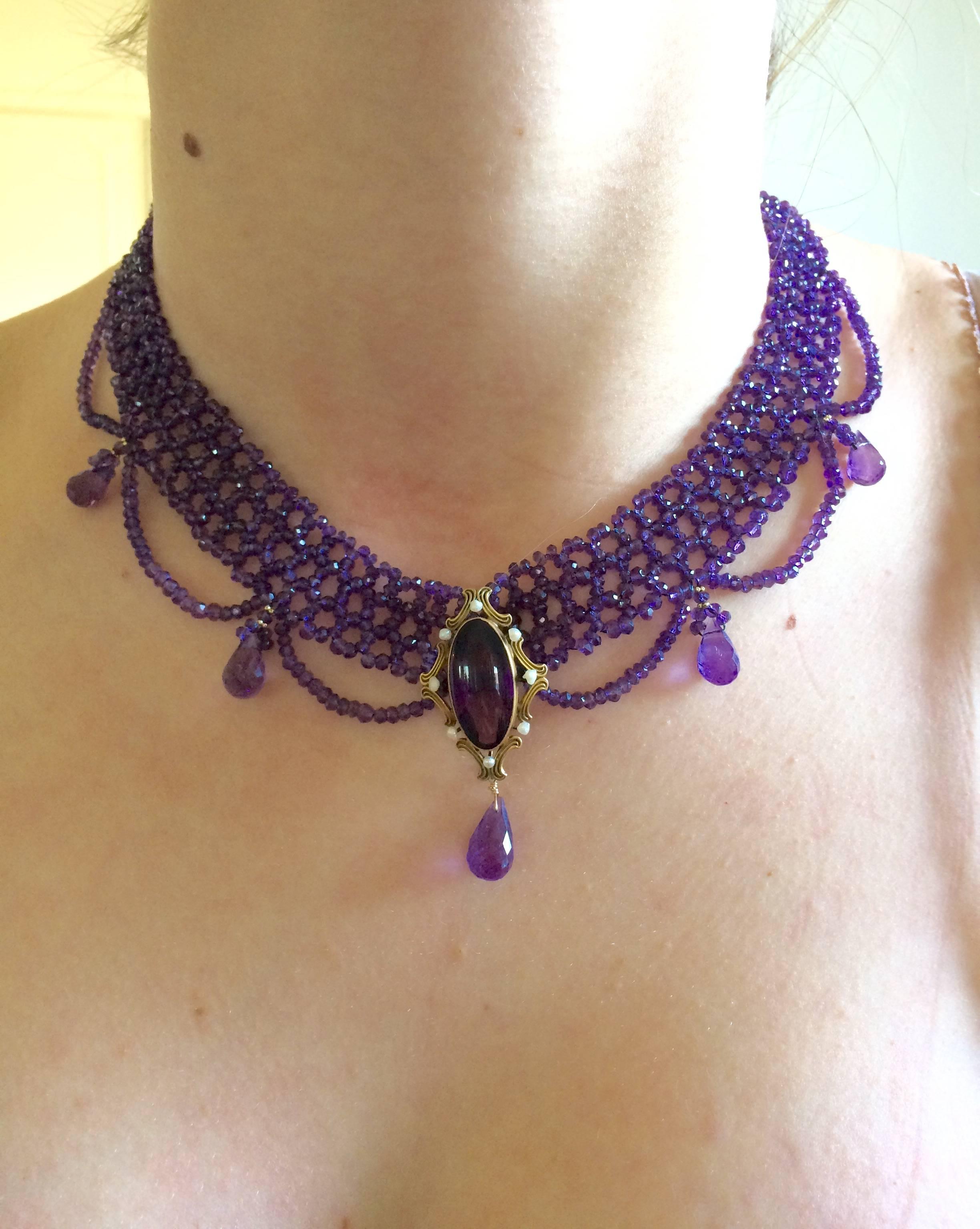 This lush and vivid necklace is meticulously woven into a tight and tapered band. The taper allows the necklace to curve around the neckline for a contoured fit. 

Faceted Amethyst beads are highlighted with tiny 14 K gold beads that dance around