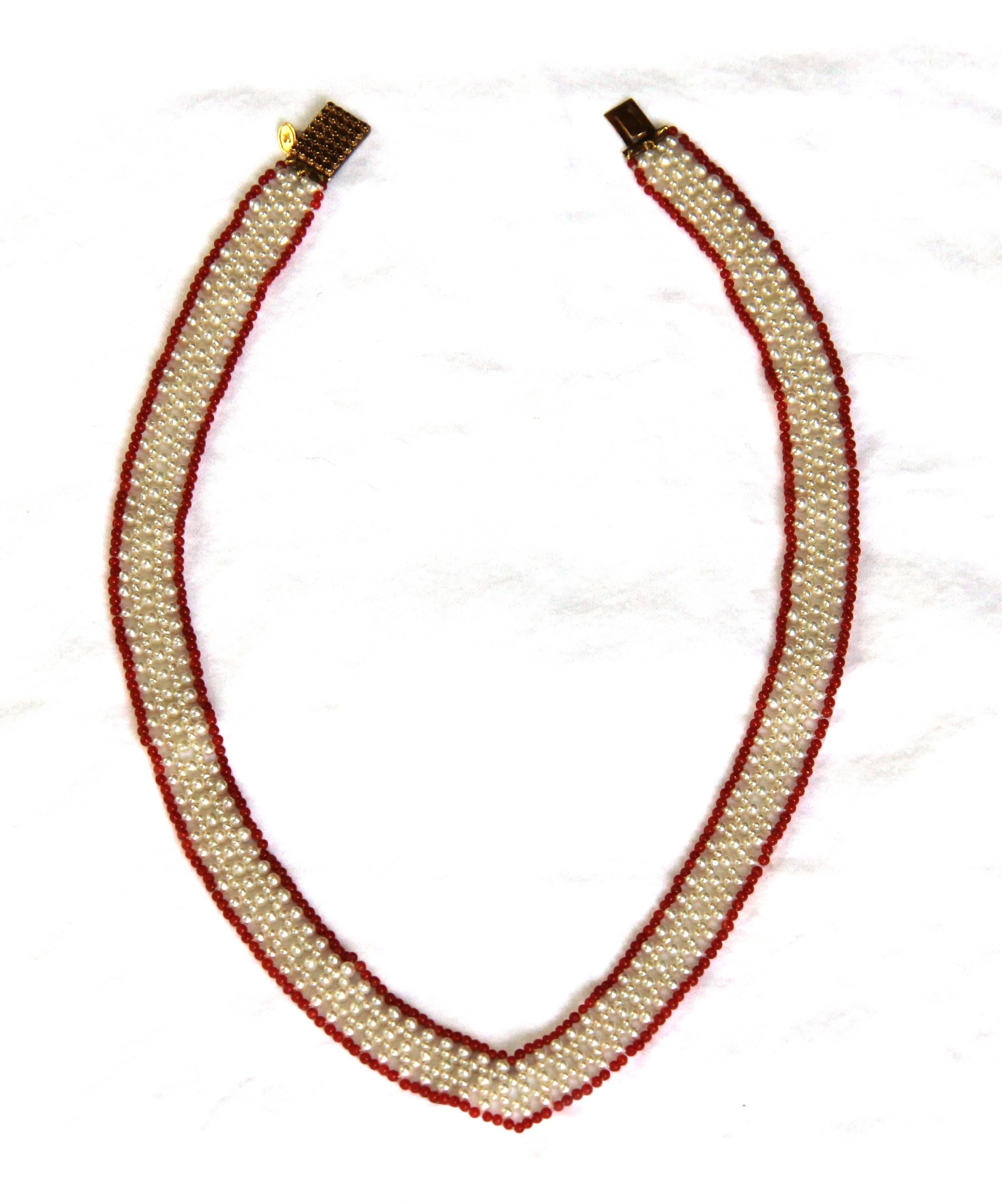 This beautiful V Shaped necklace is designed to lengthen neck neckline by creating a delicate heart-shaped curve around your neck. Intricately woven 1-2 mm white pearls and 1 mm coral beads are joined by a uniquer vintage 14k gold clasp. This day or