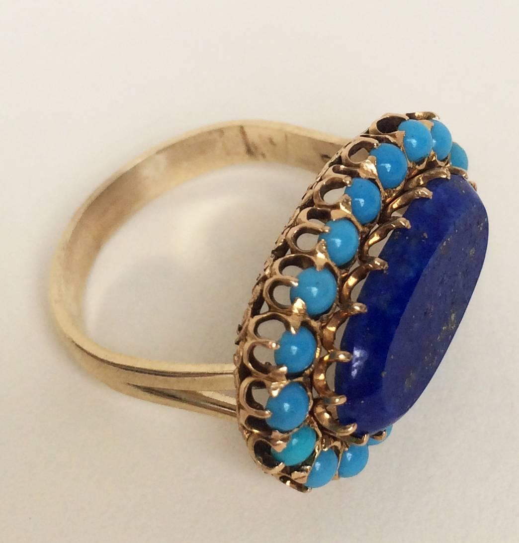 A deep blue lapis lazuli stone (size 7.5) is surrounded by fine light blue turquoise stones, and is set in a beautiful 14K yellow gold setting. The ring fits comfortably and elegantly on the hand. As part of the Marina J Turquoise and Lapis Lazuli