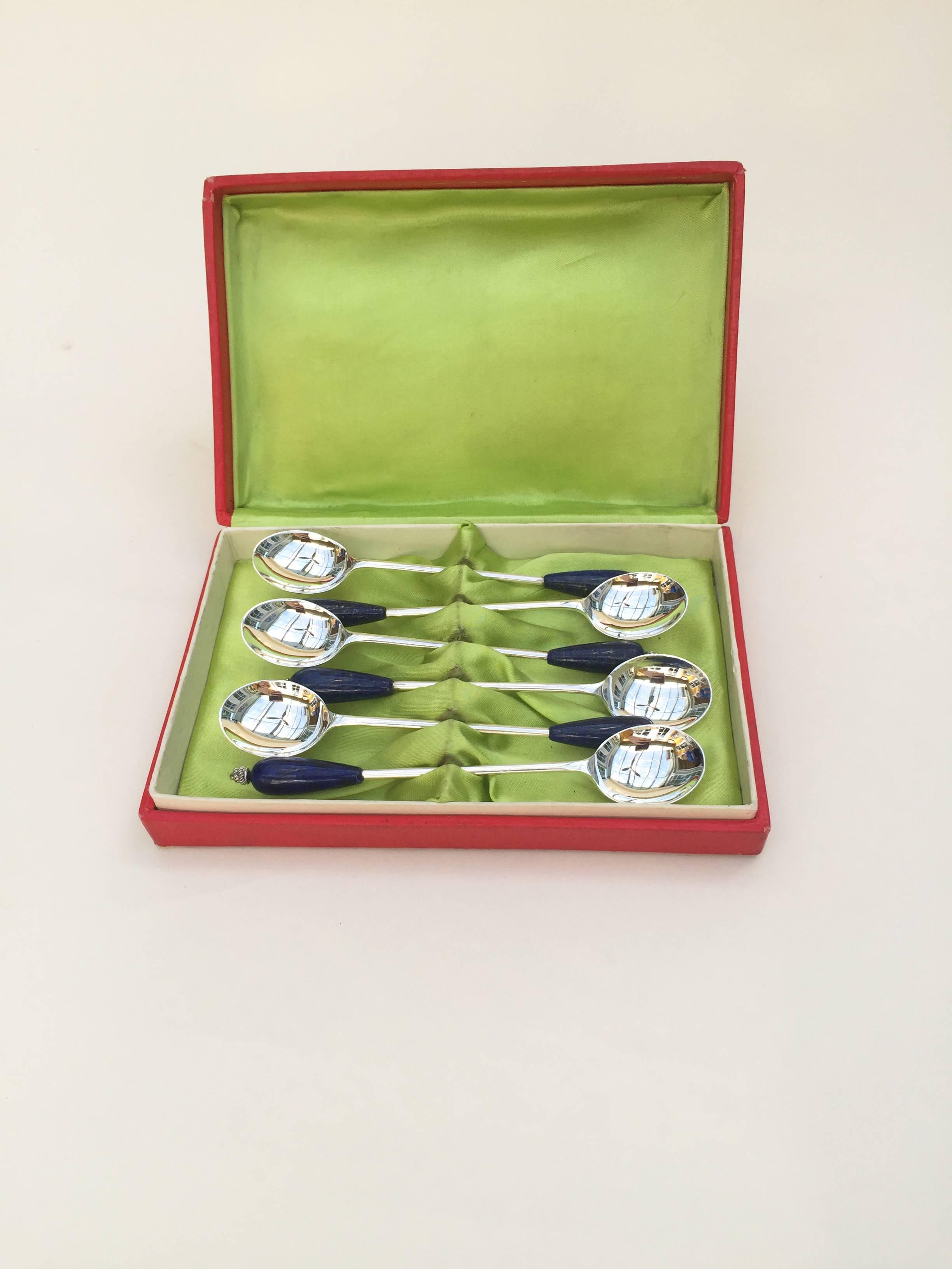 This set of 6 old English sterling silver plated tea spoons are elegantly made with lapis lazuli and sterling silver coil beaded ends. The deep royal blue of the lapis lazuli fits in with any blue porcelain tea set (Delft, Imperial Russian, and