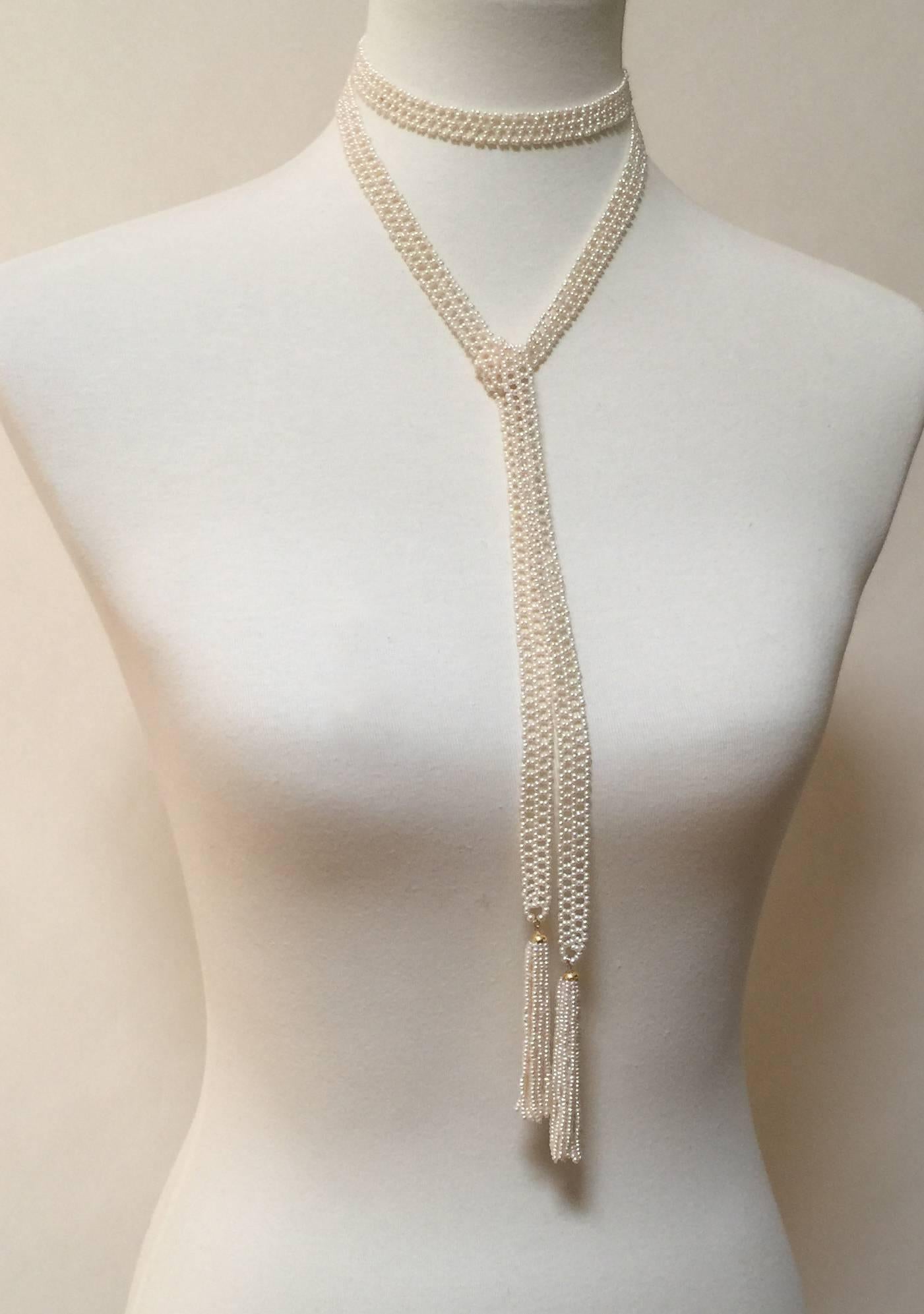 This woven seed pearl sautoir has a vintage and elegant look with creamy glow of the pearls and delicate ribbon like weave of the sautoir. At 54 inches long the sautoir can be easily styled however you want. Brooches or heirlooms can be added