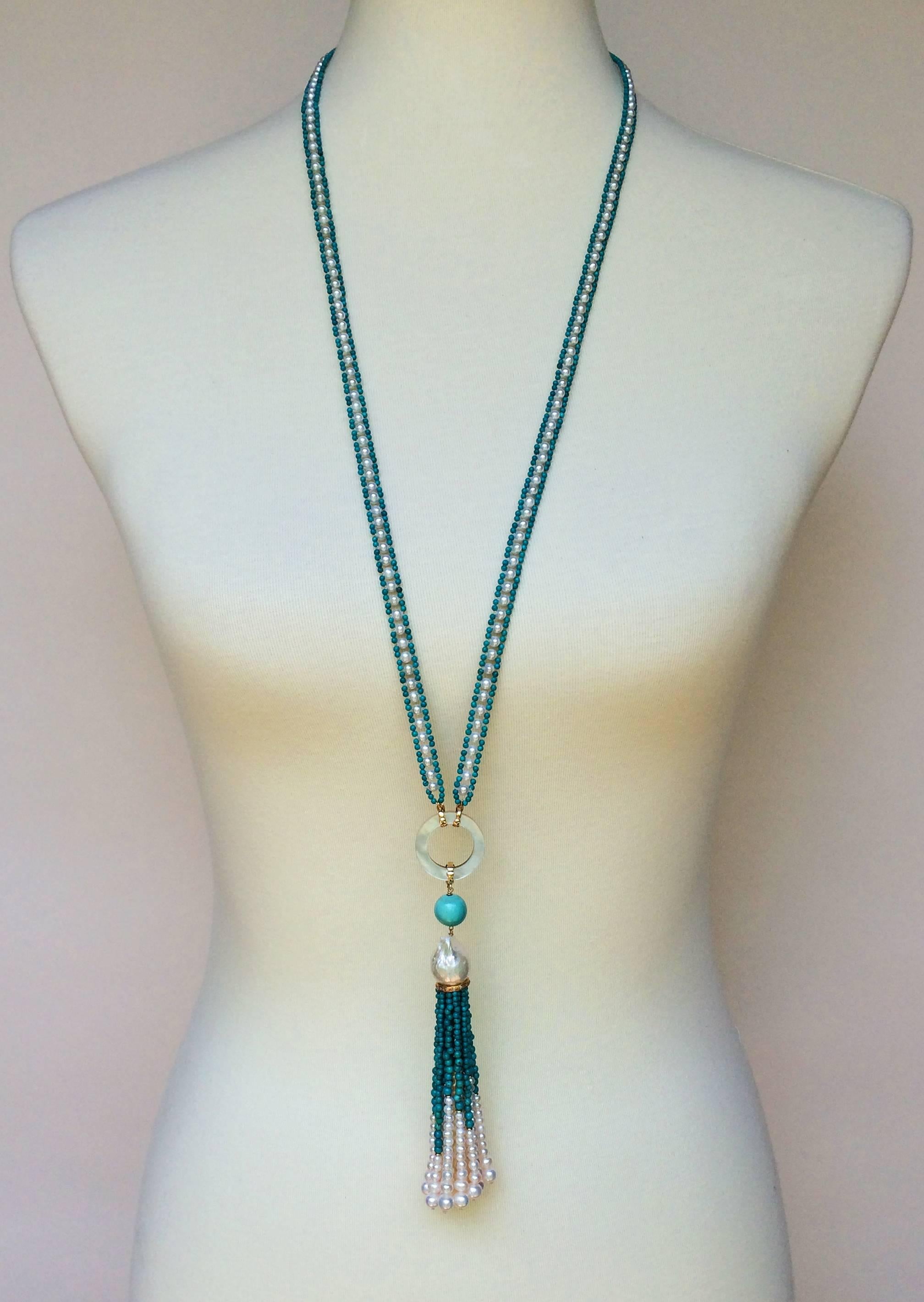 This pearl and turquoise sautoir is multi-functional and timeless. Since it is so versatile you can wear this necklace to any occasion. The ribbon is made by tightly weaving 3 mm pearls with 1.5 mm turquoise beads into a symmetrical weave, resulting
