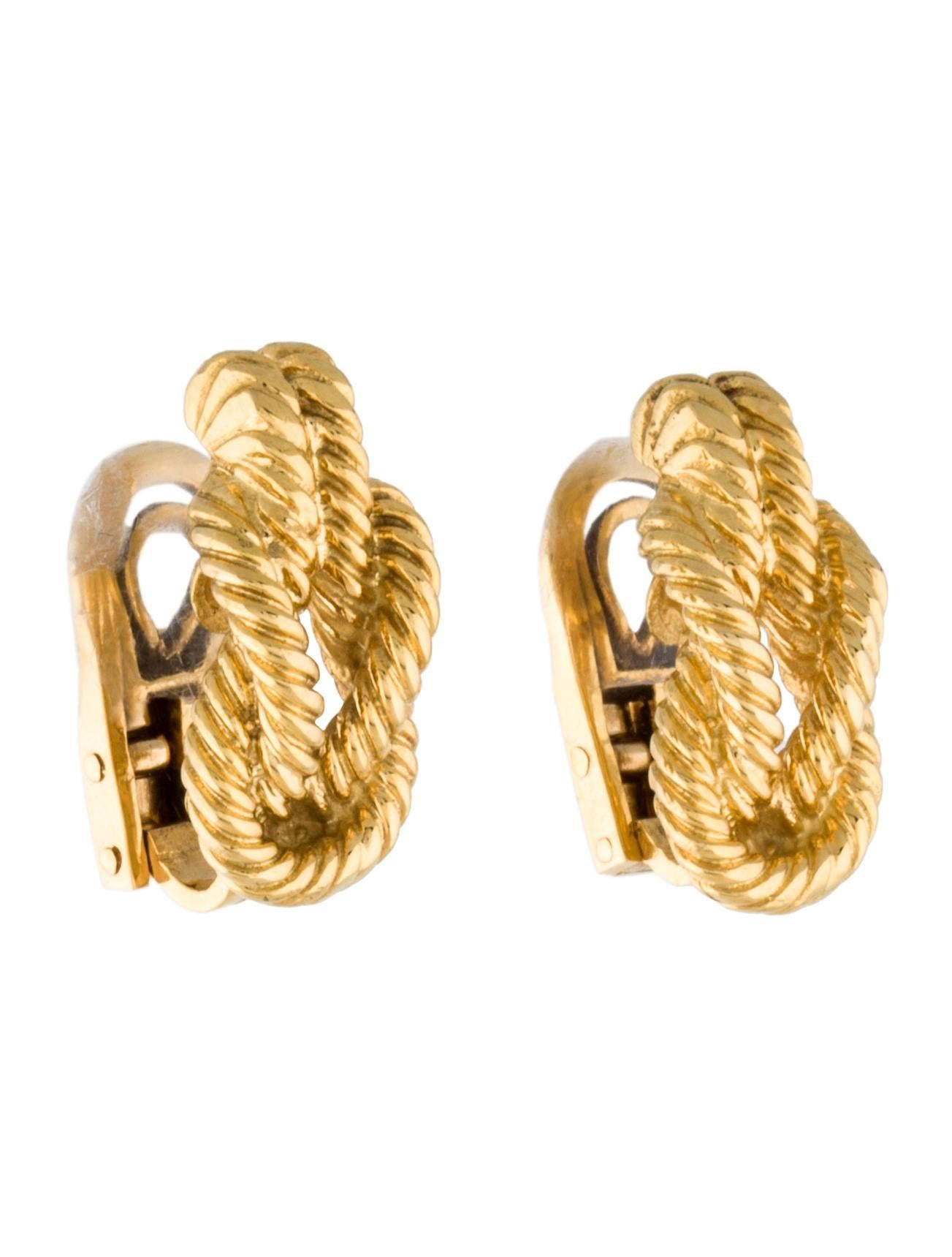 18K yellow gold Hermès Parade Knot earrings with omega back closures. Includes box.

Metal Type: 18K Yellow Gold
Hallmark: 18K
Signature: Hermes
Location: Back of Piece
Metal Finish: High Polish
Total Item Weight (g): 19.2
Period/Date:
