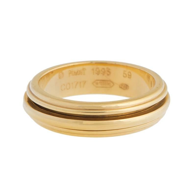 18K Yellow Gold Possession Rolling Ring 
Features:
Brand: Piaget
Condition: Brand New
Ring Size: 8.5
Metal: 18k Yellow Gold
Retail: $1,900.00