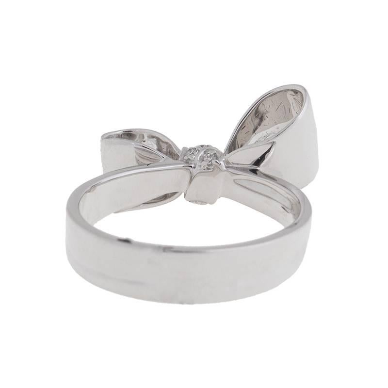 18K Mimi So Bow Diamond Ring 
Features:
Brand: Mimi So
Gender: Womens
Condition: Brand New
Ring Size: 6
Metal: 18k White Gold
Stone: Diamond 0.08 cts
Retail: $ 1,800.00