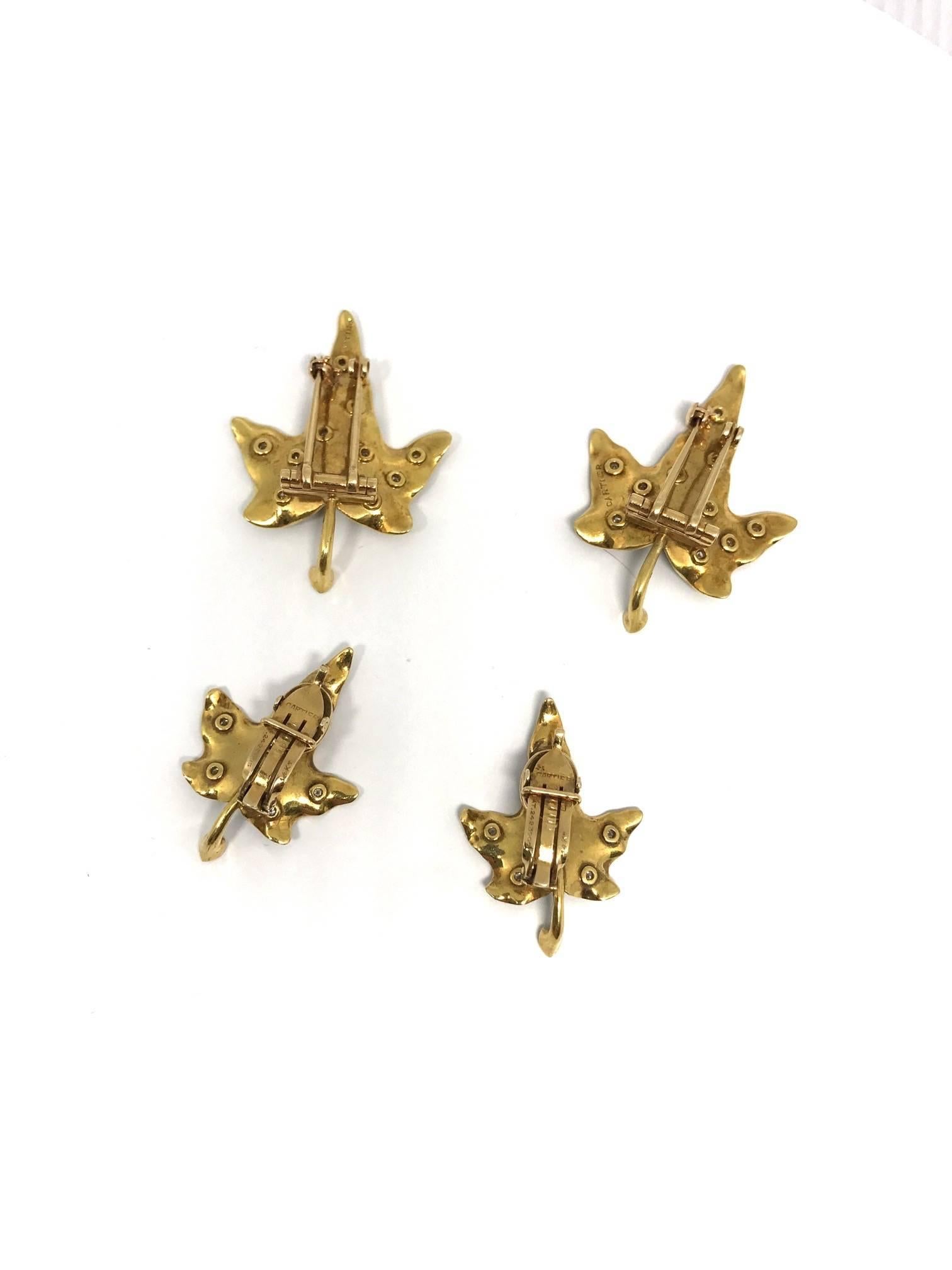 This whimsical set of four beautiful ivy leafs (2 brooches and ear clips) features leaf details complimented by diamonds (~0.5 ct). Organic yet polished, this set is truly special. 
Circa 1950, 14k yellow gold, made by the famous French house
