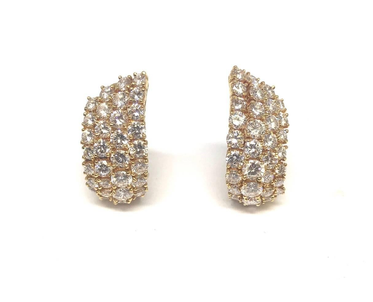 Stunning and very elegant these Cartier Fan earrings have it all.
This high end piece of jewelry is made in 18k Yellow gold with over 10 ct of the purest diamonds. 
Perfect for an evening out or day time if you really want to make a statement.