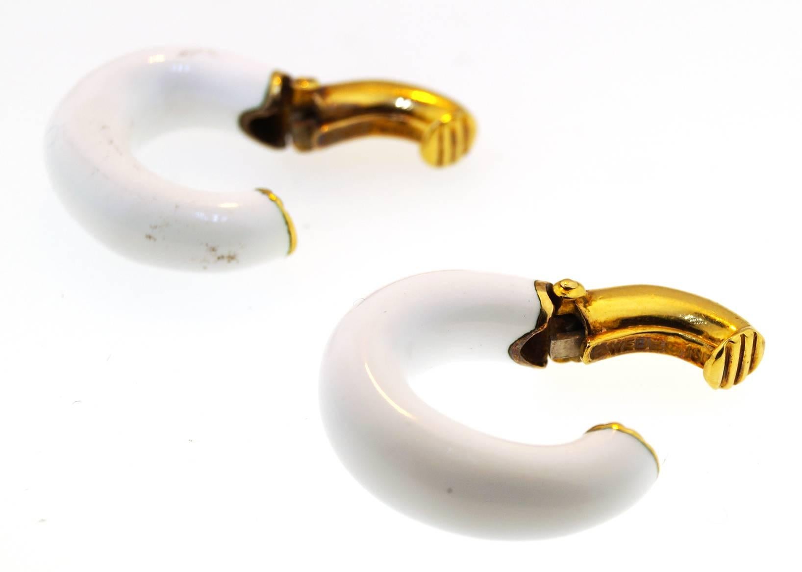 Great yellow gold earrings marked « 18K Webb » on the inside. Modern yet avant garde design with white enamel. 
These earrings measure 0.88 high. A modern piece for your collection. 