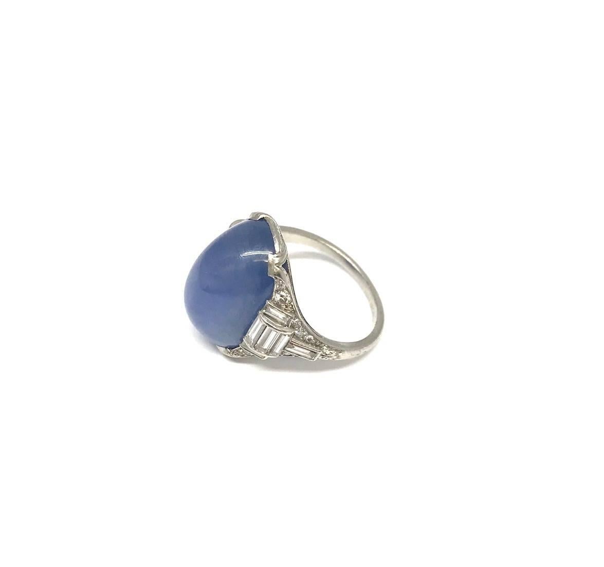 Art deco is the ultimate chic and this ring is the perfect representation of it ! 
The phenomenal star sapphire  ( approx. 16 ct ) is set in a platinum & diamond mounting made by the New York historical house Oscar Heyman. 
If you feel like your