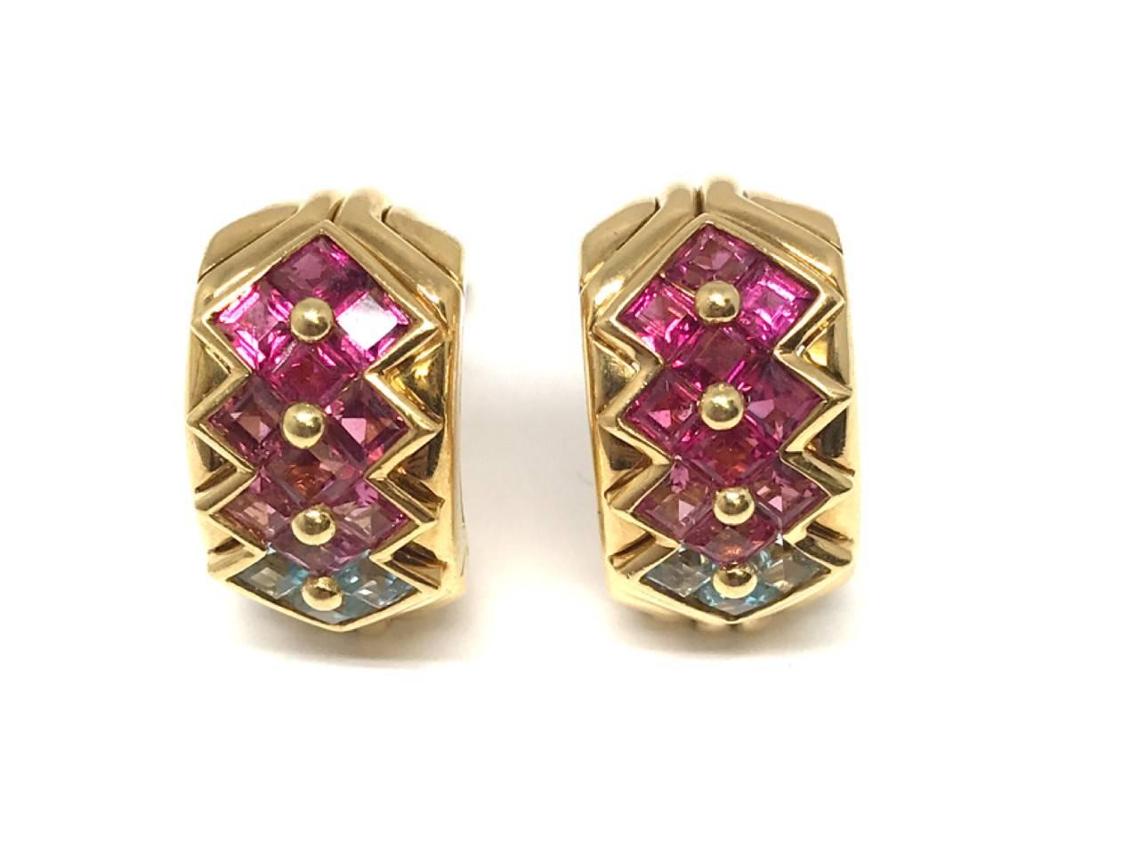 These Bulgari Pink Tourmaline and Amethyst earrings are ready to make you shine! 
Great compliment to either a day or night on the town, the gems are housed in 18k Yellow Gold. 
Signed and numbered clip on style earrings.