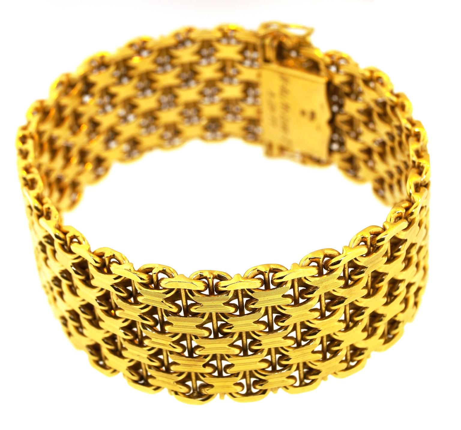 The legendary Swiss Gubelin is known for the trend-setting creation.
This beautiful cuff bracelet is made with 18k yellow gold and weights 69,83 dwt. 
This bracelet is 7.5 in long.
A beautiful wearable bracelet which could work for special event