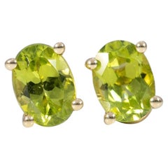 Peridot Four-Prong Stud Earrings in Solid 14K Gold - Oval, 7×5mm - Fine Jewelry