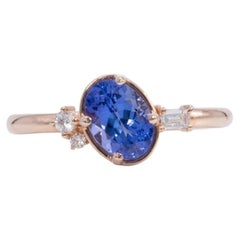 AAA Tanzanite Ring with Earth-Mined Diamond Accents: Solid 14K Gold, 7x5mm