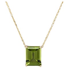 2.39ct Peridot Solitaire Pendant in Solid 14K Yellow Gold Emerald Cut 7x9mm