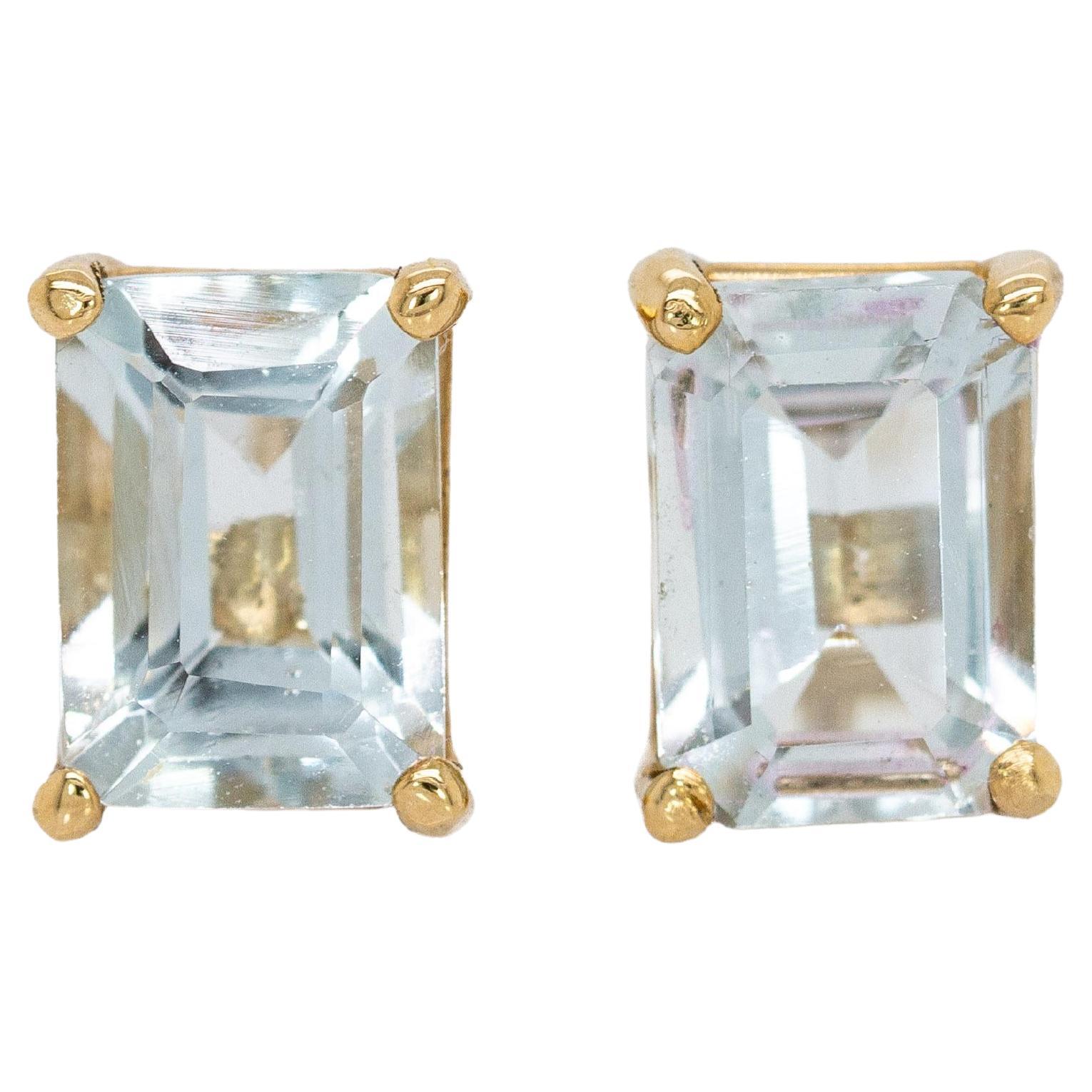 Borchie con acquamarina solitaria 7x5 mm in oro massiccio 14K