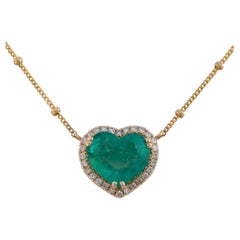 Colgante de corazón con esmeralda colombiana de 2,9 quilates, certificado por la GIA, con halo de diamantes, en oro de 14K
