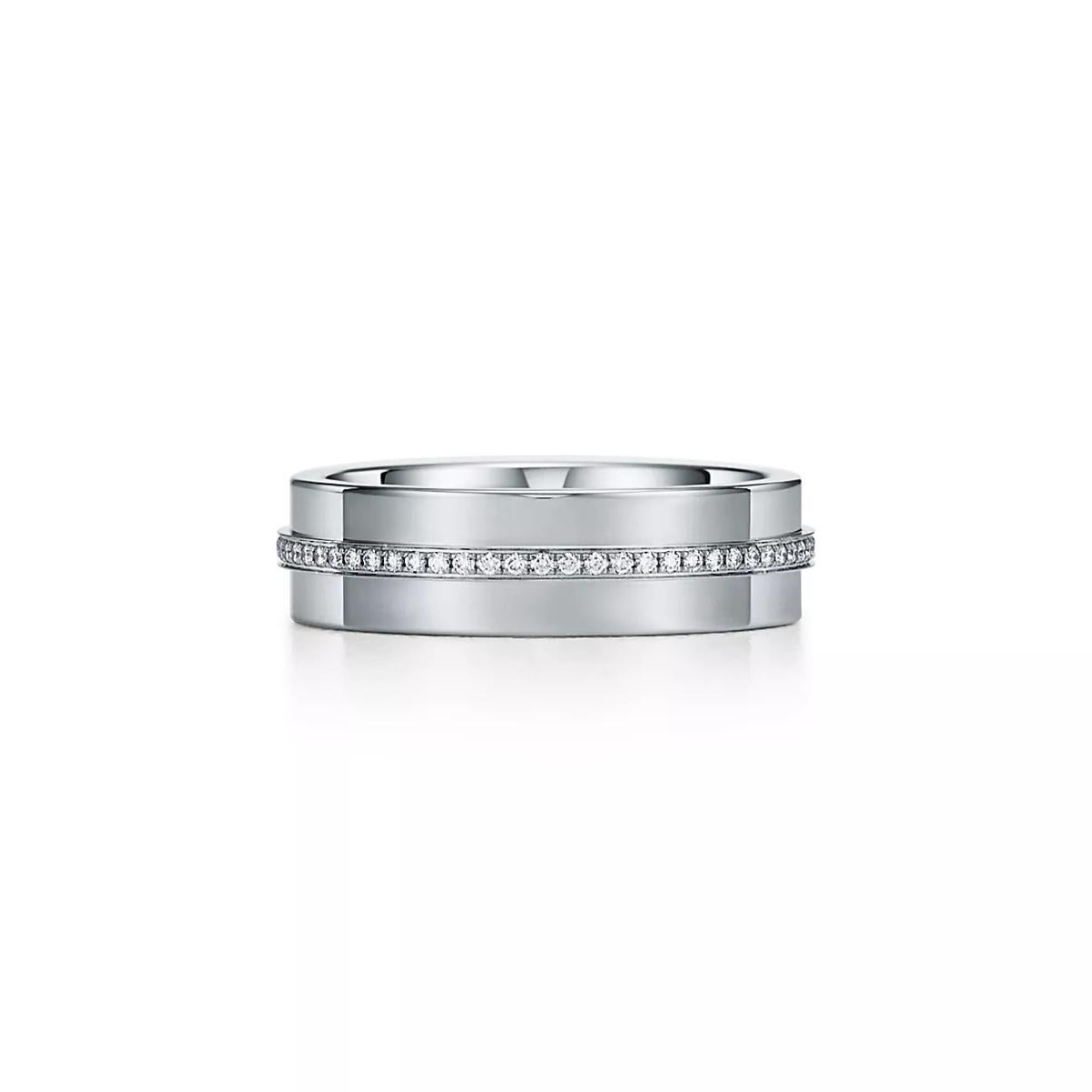 Taglio rotondo TIFFANY & Co. Anello a T con diamante largo 5,5 mm in oro bianco 18K 9 Nuovo in vendita