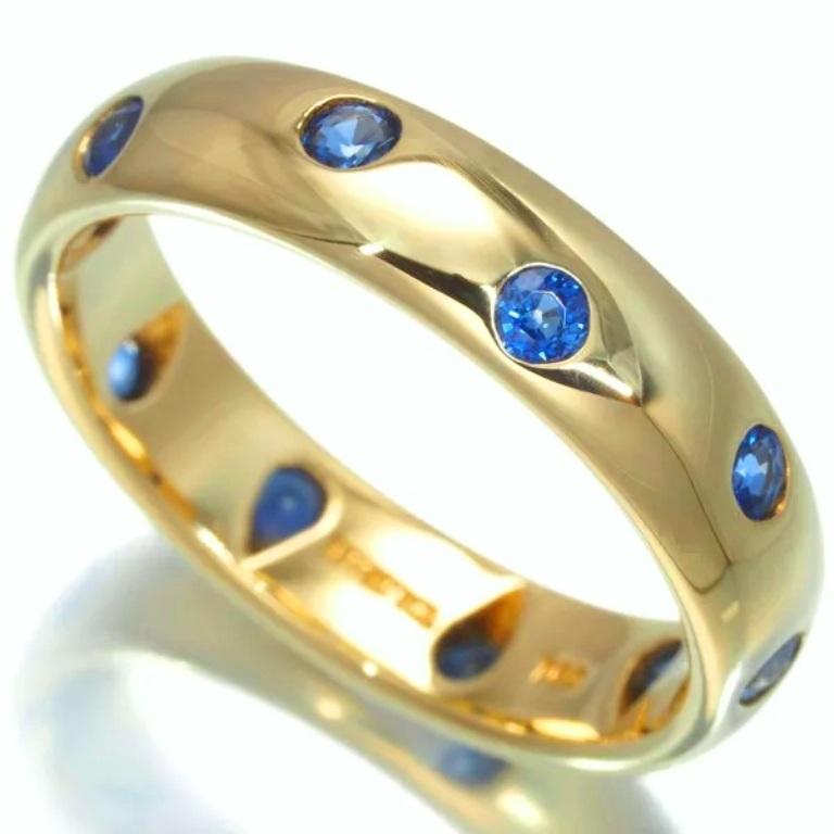 TIFFANY & Co. Anello a fascia con zaffiro in oro 18 carati Etoile 6

Metallo: Oro giallo 18 carati 
Dimensione: 6
Larghezza della banda: 4 mm
Peso: 5.10 grammi
Zaffiro: 10 zaffiri rotondi, peso totale 0,25 carati circa. 
Marchio di garanzia: