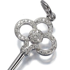 TIFFANY & Co. 18K White Gold .11ct Diamond Crown Key Pendant 1.5"