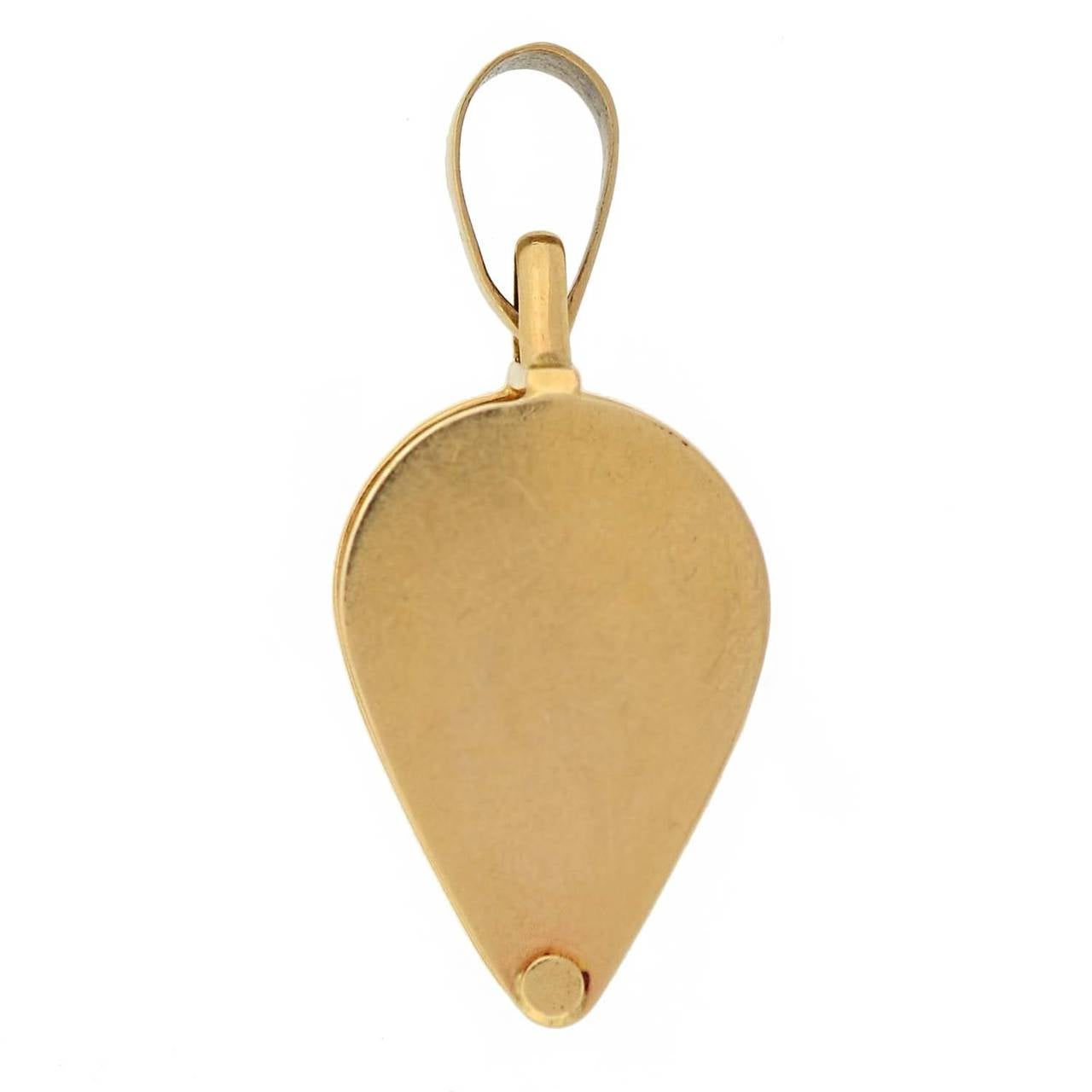 This solid 14kt gold jeweler's loop makes a fabulous pendant! All sides of the loop have a smooth, yellow gold surface and brightly polished finish. The lens is encased in yellow gold and has a 10x magnification when used, allowing the wearer to