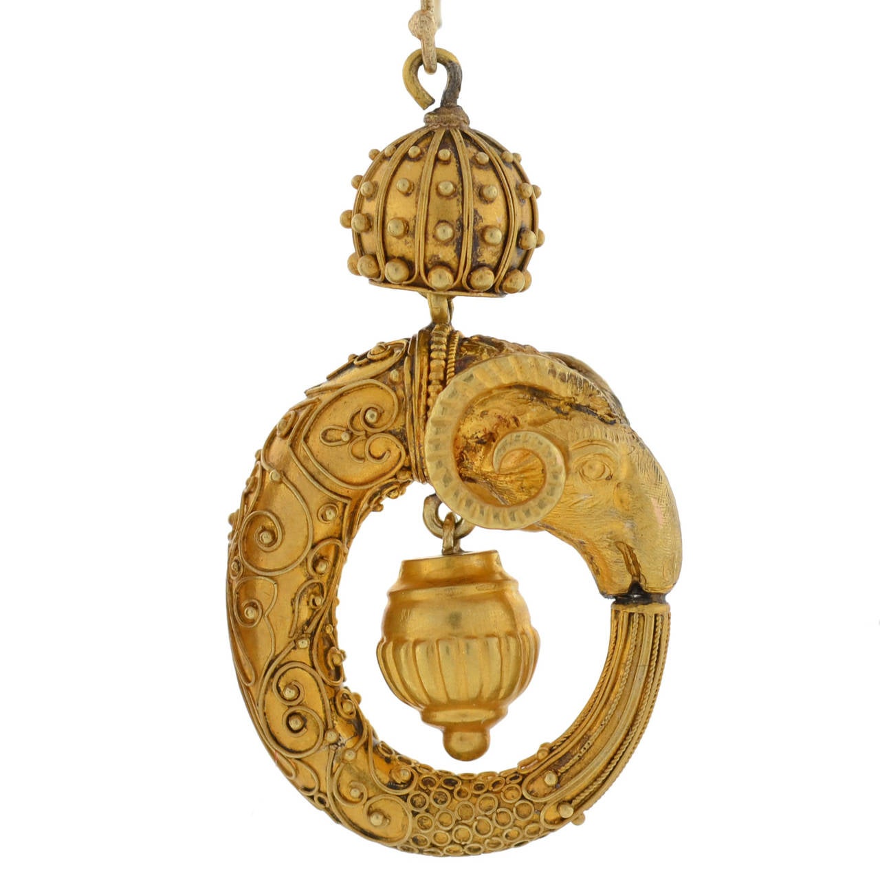 A truly exceptional pair of gold ram's head earrings from the Victorian (ca1880) era! Made of vibrant 15kt yellow gold, the earrings have an elaborate handmade design. Each earring is comprised of an impeccably detailed three-dimensional ram's head,