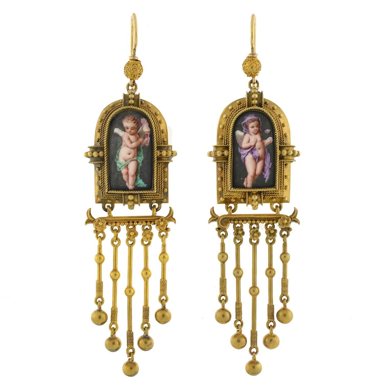 An absolutely beautiful porcelain earring and pendant set from the Victorian (ca1880) era! Fit for a piece in a museum, this wonderful set is comprised of a pair of earrings and a complimentary pendant. These three pieces depict a different, but