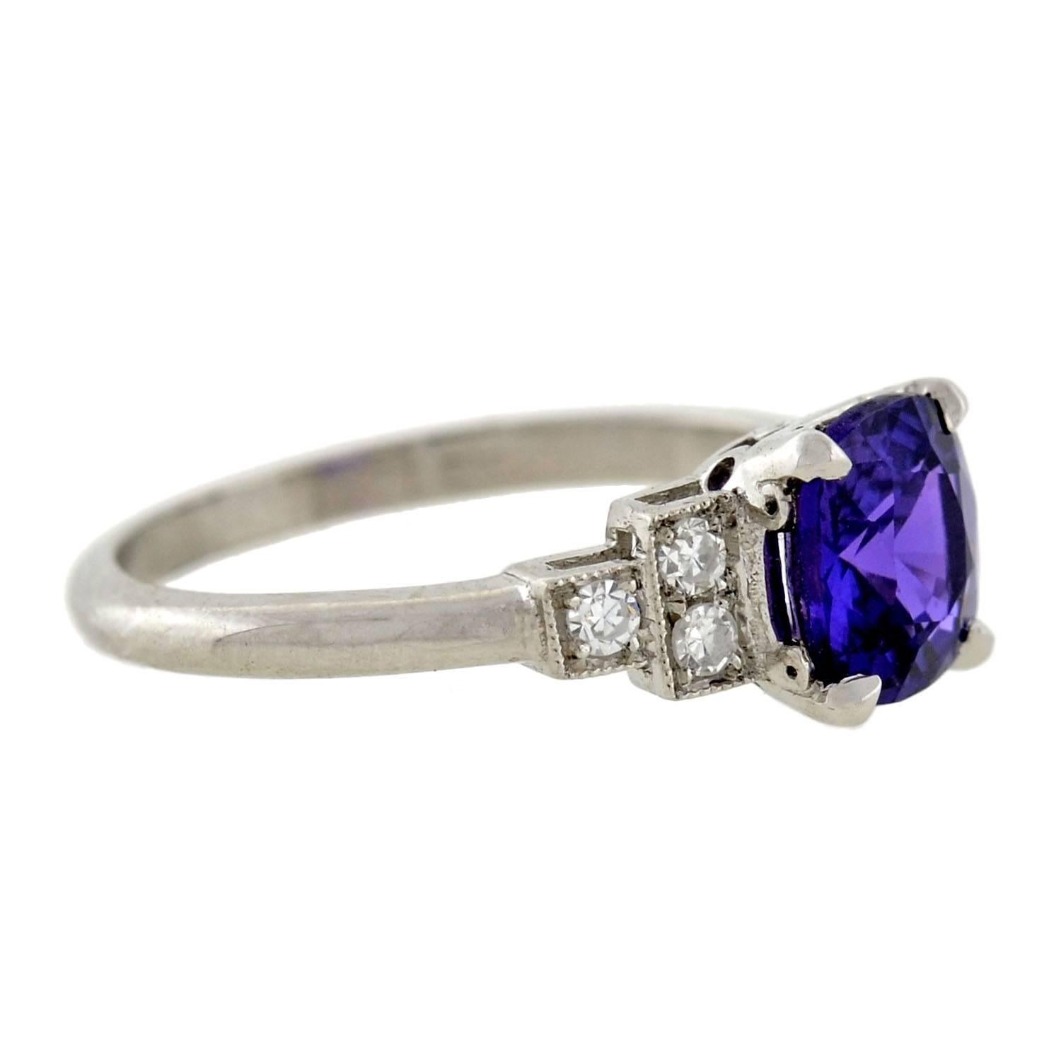 An exquisite and very rare gemstone ring in a traditional Art Deco era style! The handmade platinum mounting is a classic 