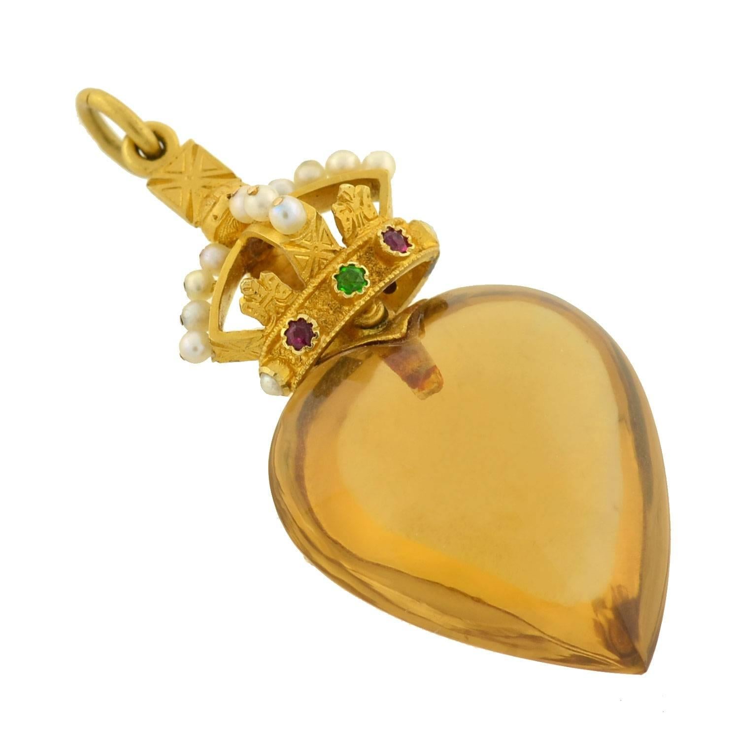 An absolutely fabulous and unusual Queen's Heart citrine and pearl pendant from the late Victorian (ca1900) era! This stunning royal piece is comprised of a single citrine heart, which has a 3-dimensional look and is fairly large in size. Riveted