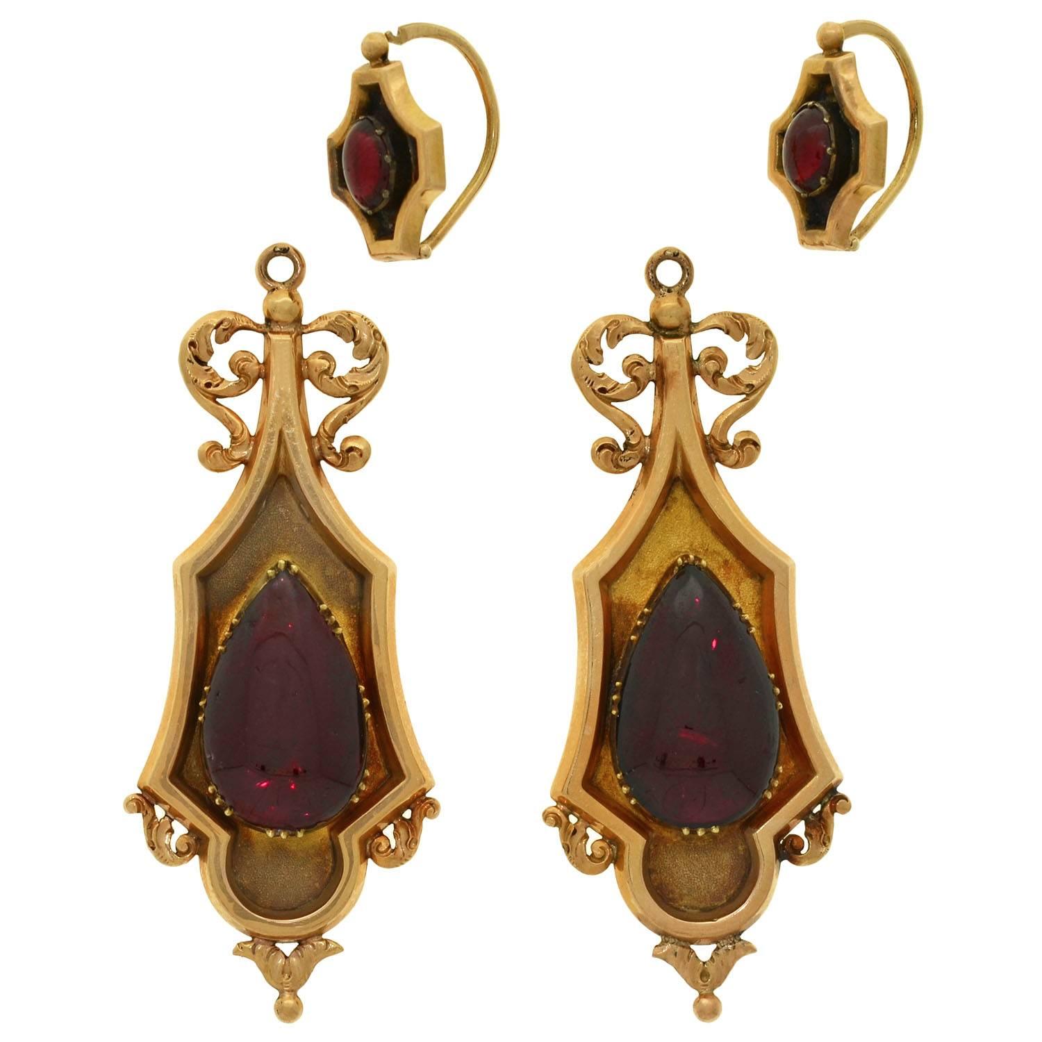 Absolutely incredible cabochon garnet earrings from the Georgian (ca1830) period. These fantastic earrings are made of 18kt gold and are particularly large in size. With a magnificent and royal-looking appearance, each earring has a smooth gold