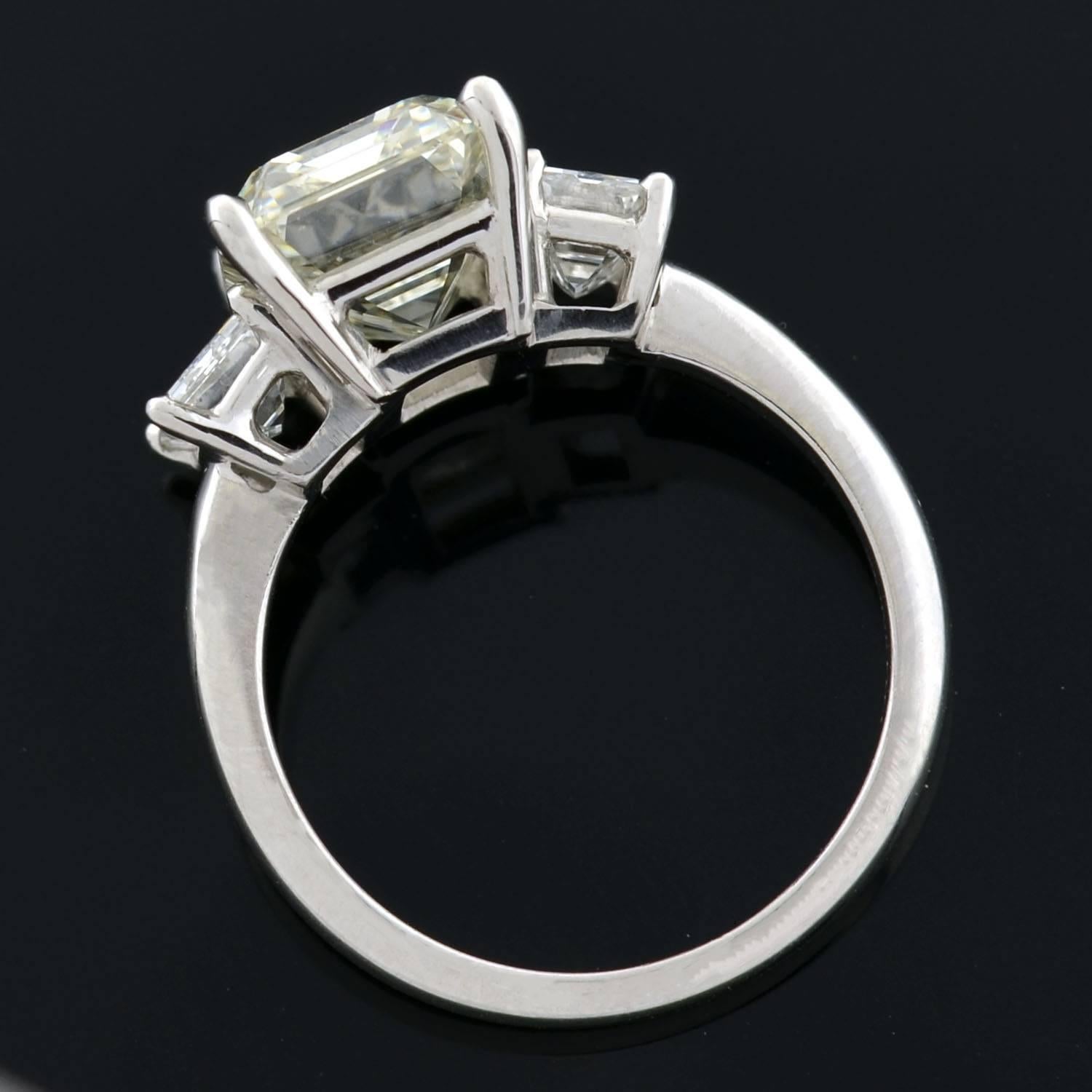 Women's Contemporary 4.13 Carat Emerald Cut Diamond Platinum 3 Stone Engagement Ring 