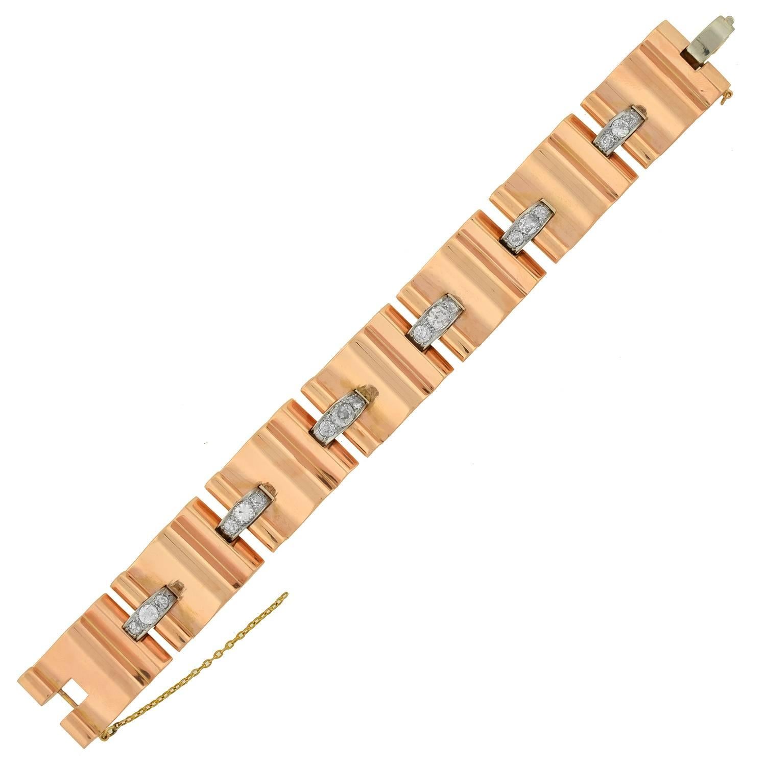 Glamour and luxury jewelry began in Hollywood during the 1940's and 1950's with the be-jeweled glamour gals. This fabulous retro bracelet is a fine example from that era (ca1940). An absolutely stunning piece, the bracelet is made of 14kt rose gold