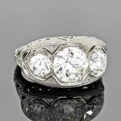 Art Deco 3-Stone 2.55 Carats Diamonds Platinum Filigree Ring