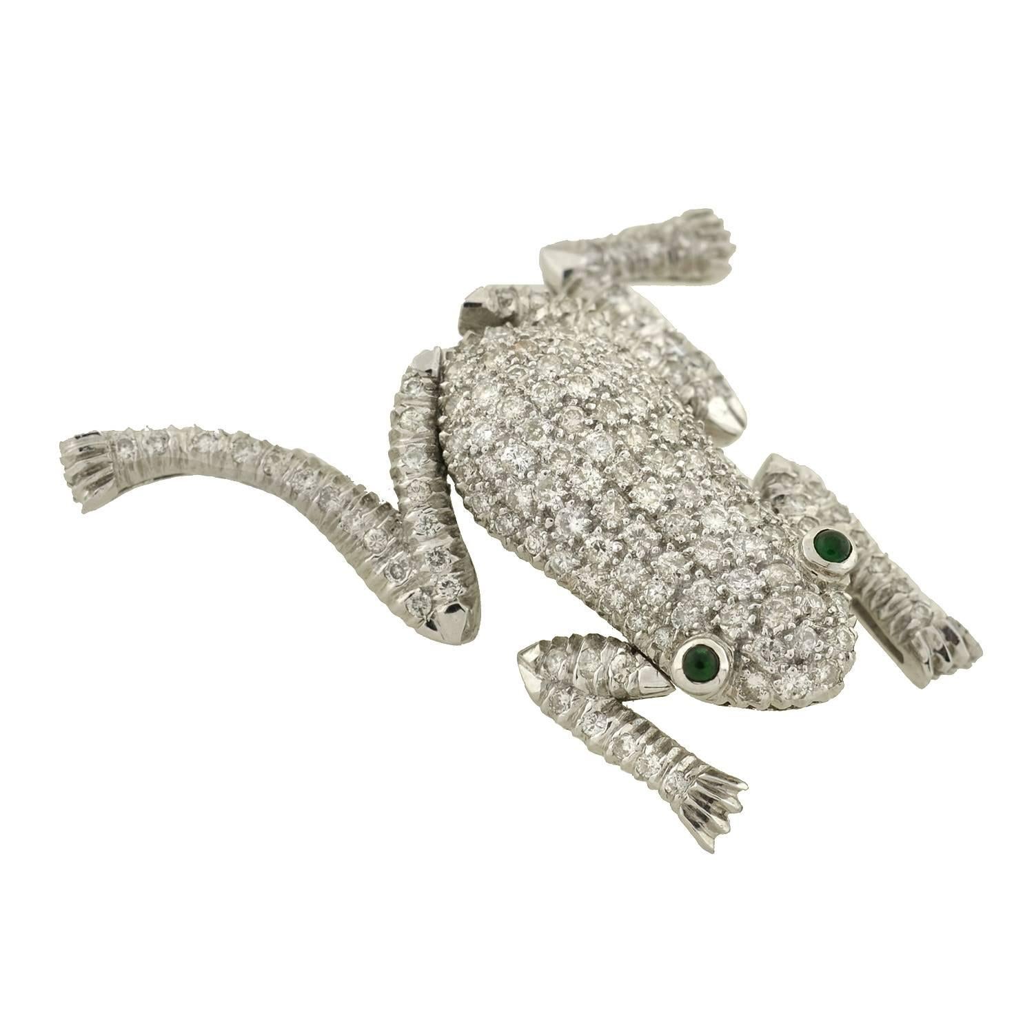 An absolutely charming frog pin from the 1960’s! This wonderful diamond encrusted piece depicts a handsome frog and has a 3-dimensional look. The diamonds are pave set within 18kt white gold and have a total overall weight of approximately 2.00ct