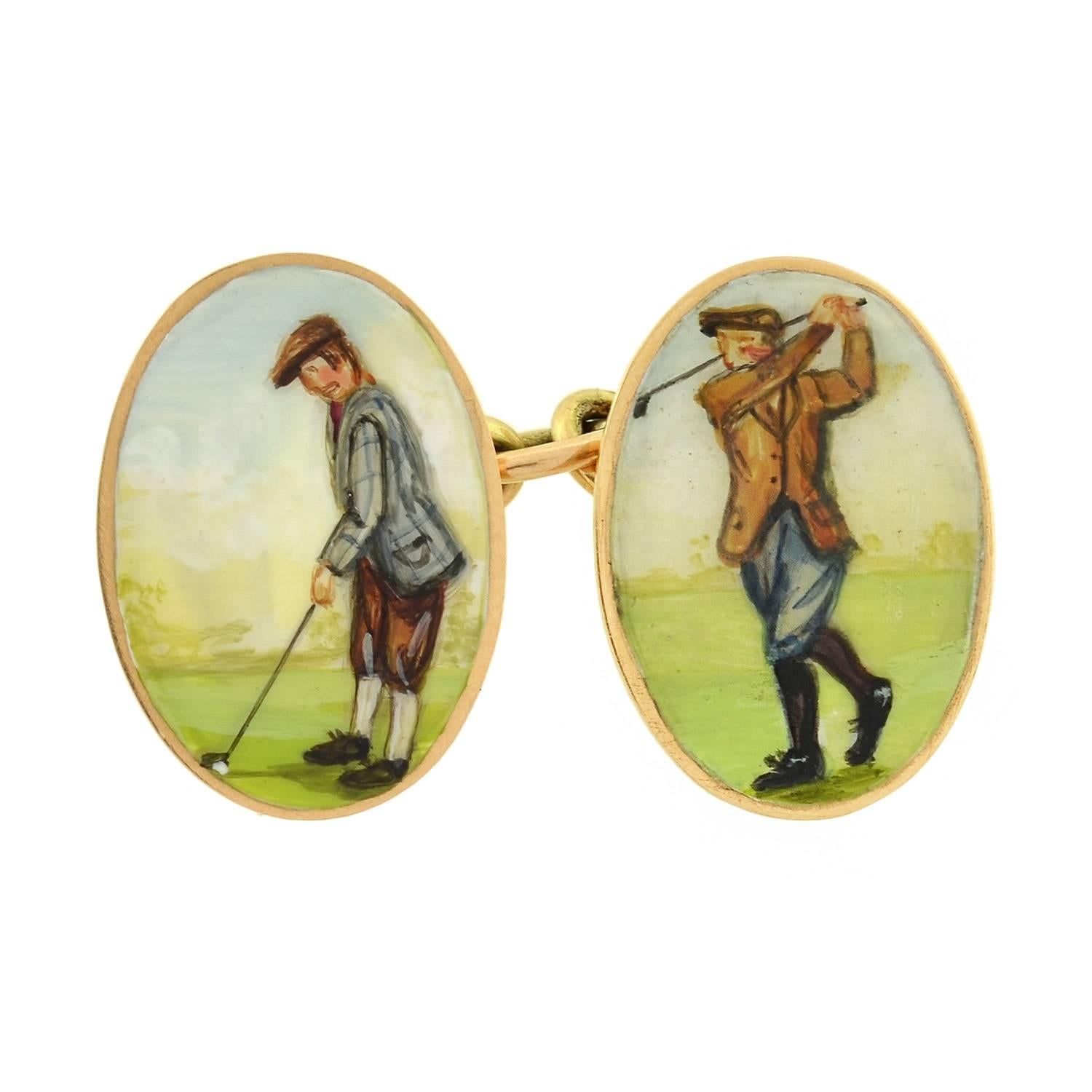 A wonderful pair of enameled cufflinks from the Victorian (ca1880) era! English in origin, each 15kt gold cufflink has a double-sided design comprised of two oval discs. Each disc depicts a unique golf motif, which is illustrated in hand-painted
