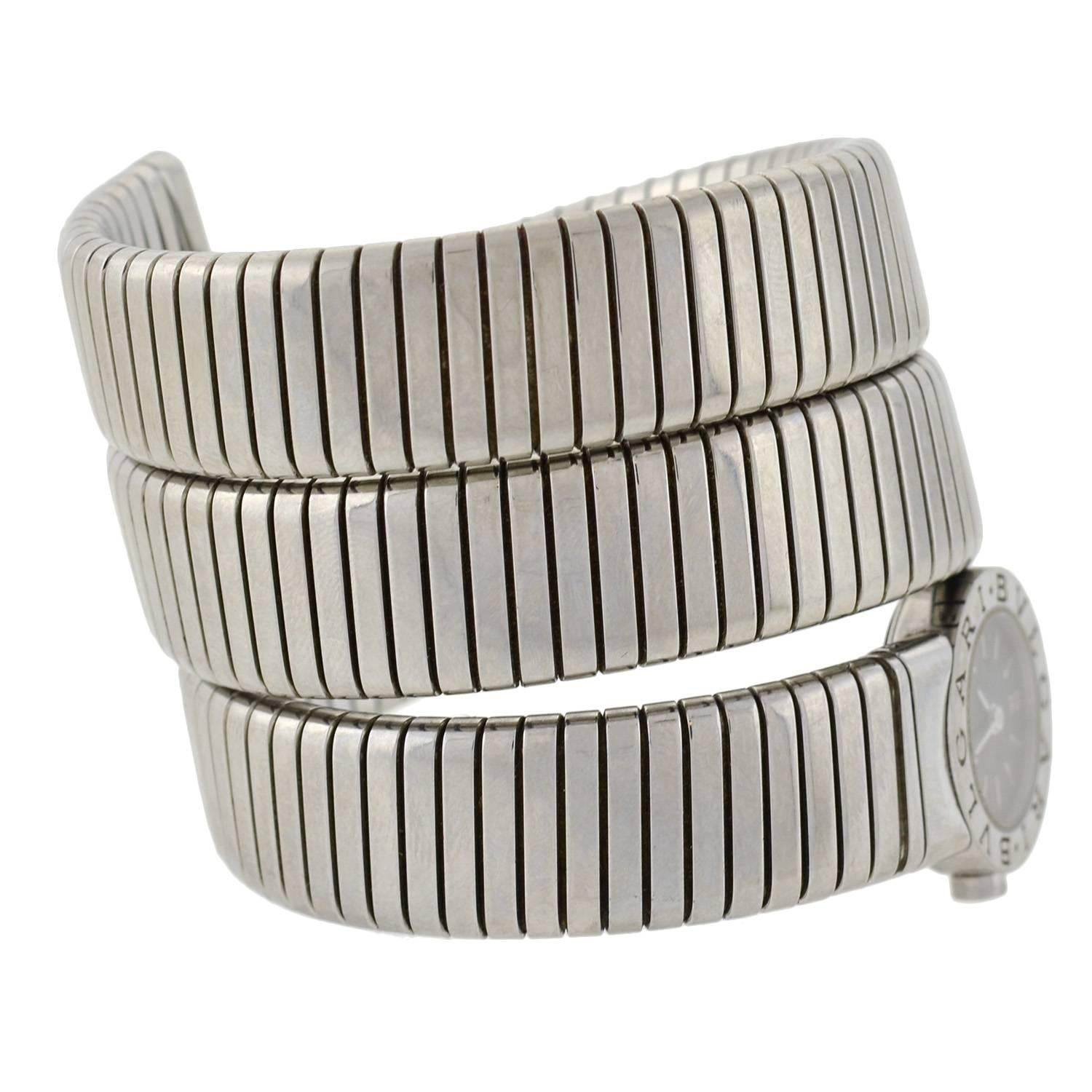 This fabulous watch bracelet is a signed estate piece by Bvlgari! Known as the "Serpenti Tubogas" watch, this stainless steel model has a stylish wrap-around design. The flexible watch band has a ridged surface and snake-like appearance