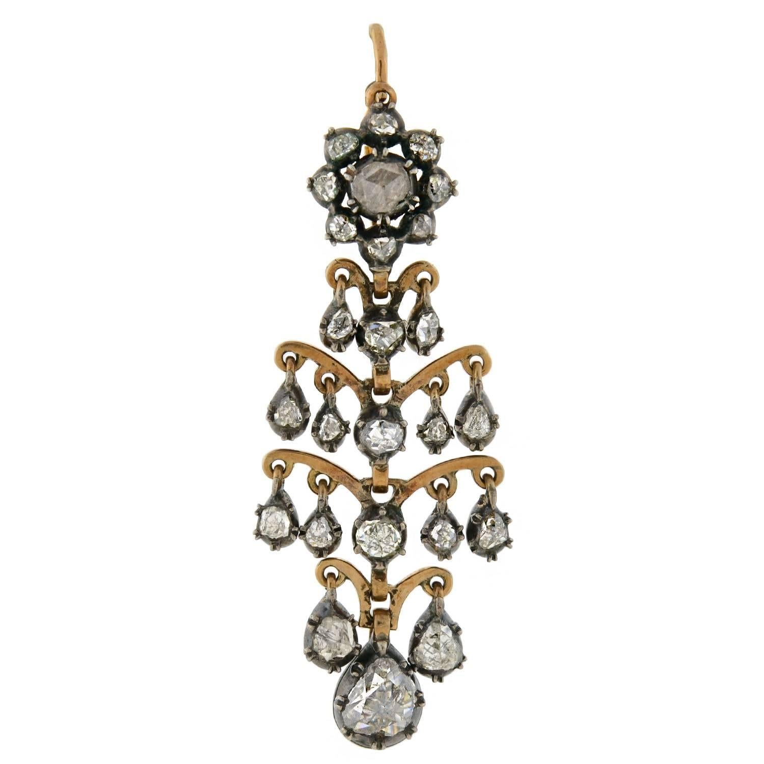 Exquisite Victorian (ca1880) Rose Cut diamond earrings! These incredible earrings are made of 18kt rosy yellow gold topped with sterling silver and are dripping with sparkling old Rose Cut diamond stones. Each earring begins with a single belcher
