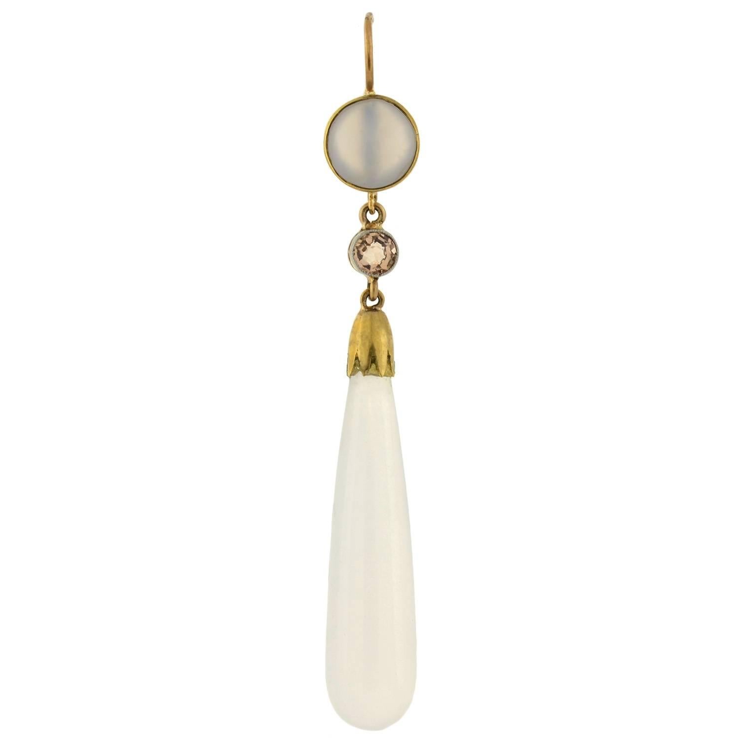 Wonderful chalcedony and zircon earrings from the Victorian (ca1880) era! Each earring begins with a bezel set chalcedony disc that rests within vibrant 14kt yellow gold. Dangling from the chalcedony surmount is a bezel set zircon. The faceted