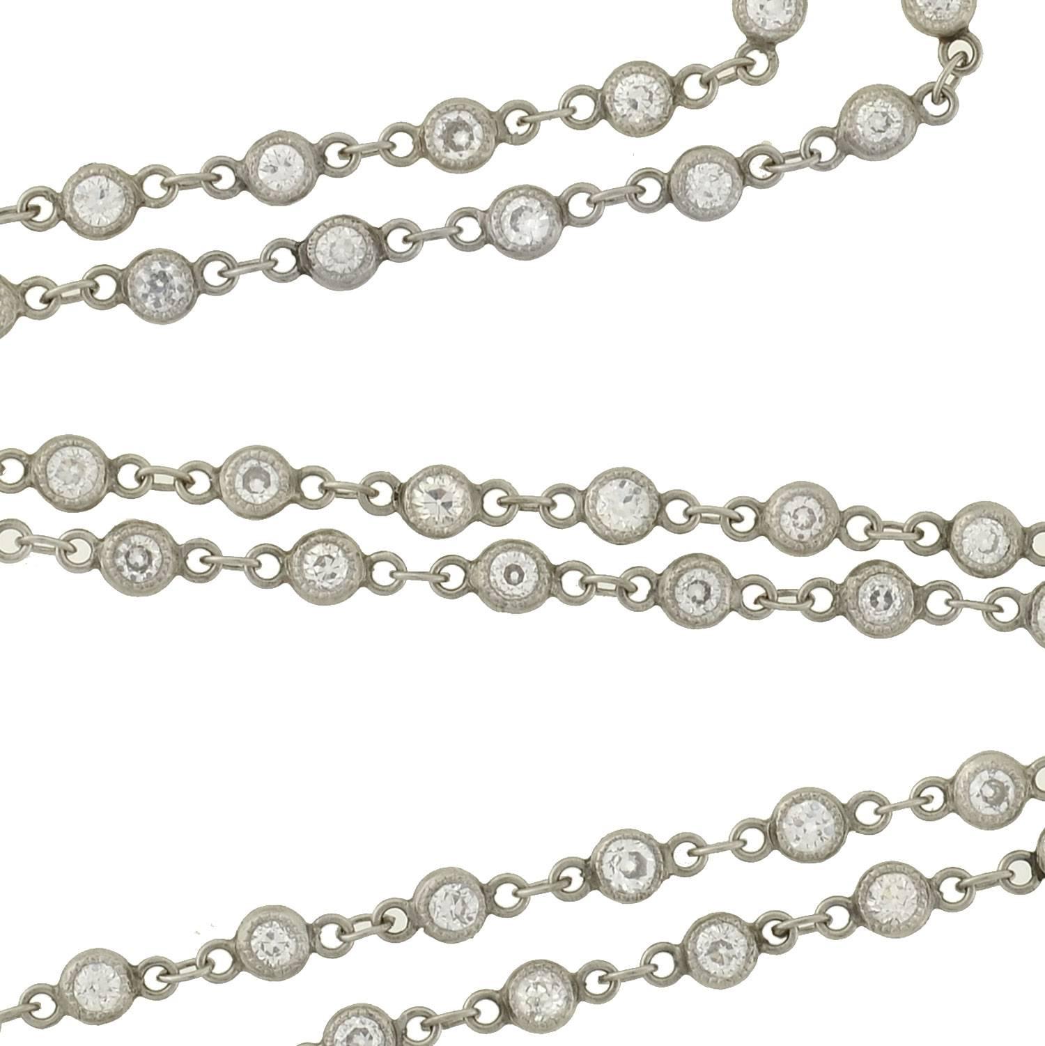 A beautiful diamond necklace from the Edwardian (ca1910) era! Crafted in platinum, the necklace is comprised of delicate diamond links that form a fine, flowing chain. Each diamond is set in a milgrained bezel, and is connected with delicate